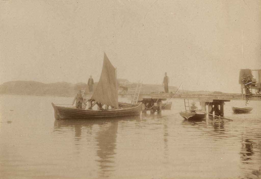 Sail boat at a jetty