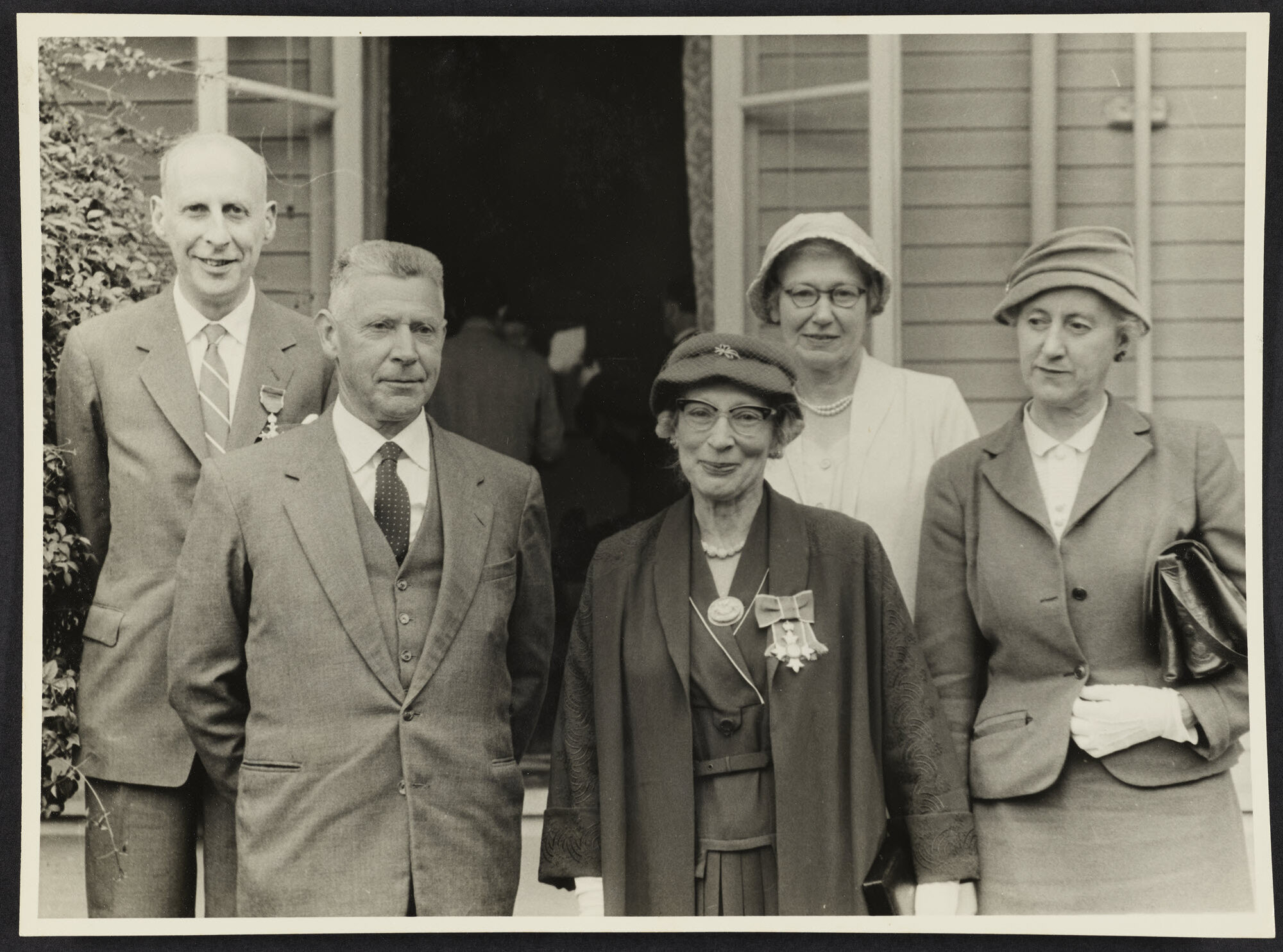 Group of five, including Dr Muriel Bell