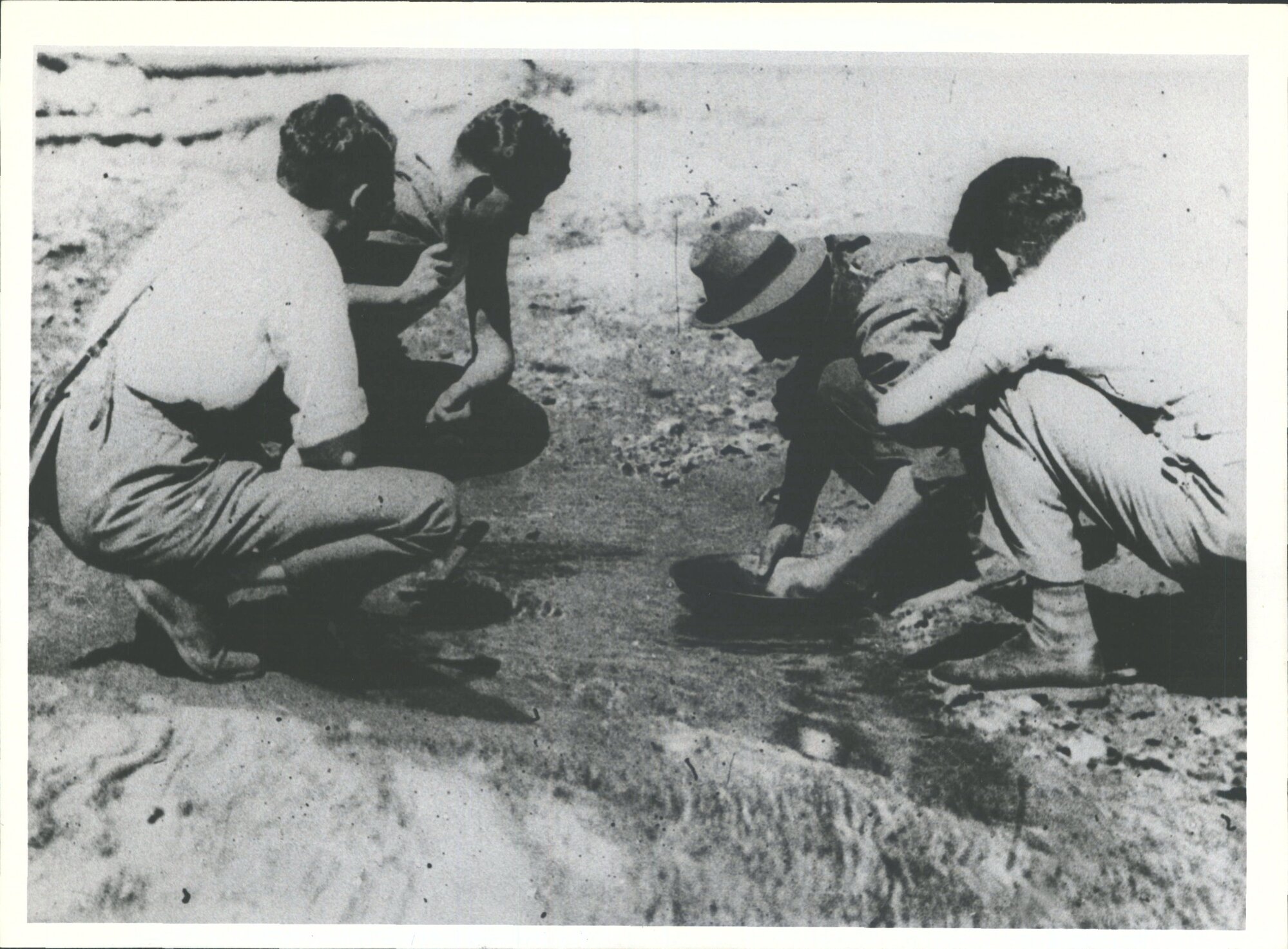 Gold panning "Use for Handley's dems" (Photo used to demonstrate gold panning)