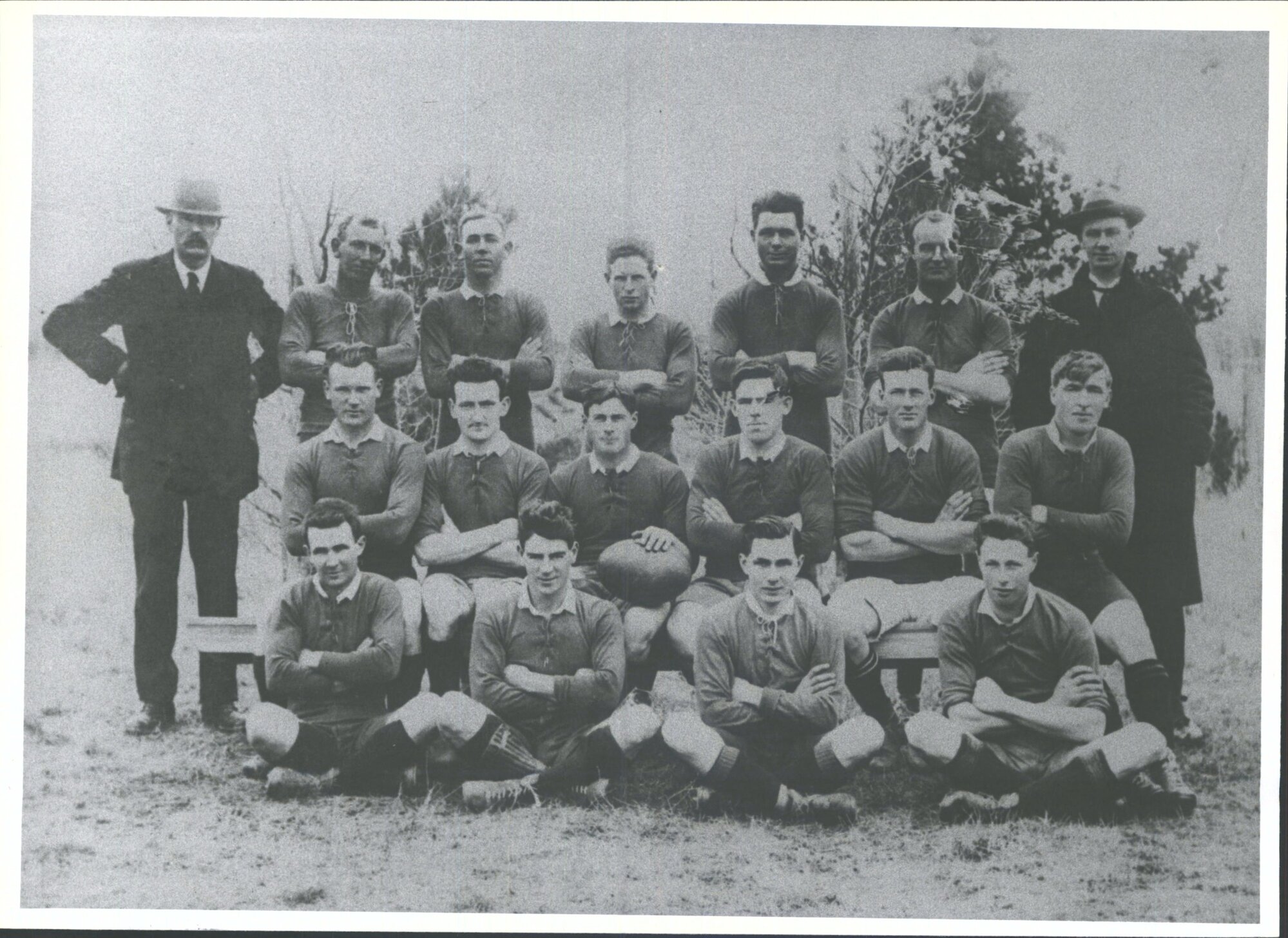 [Team photo with coaches]