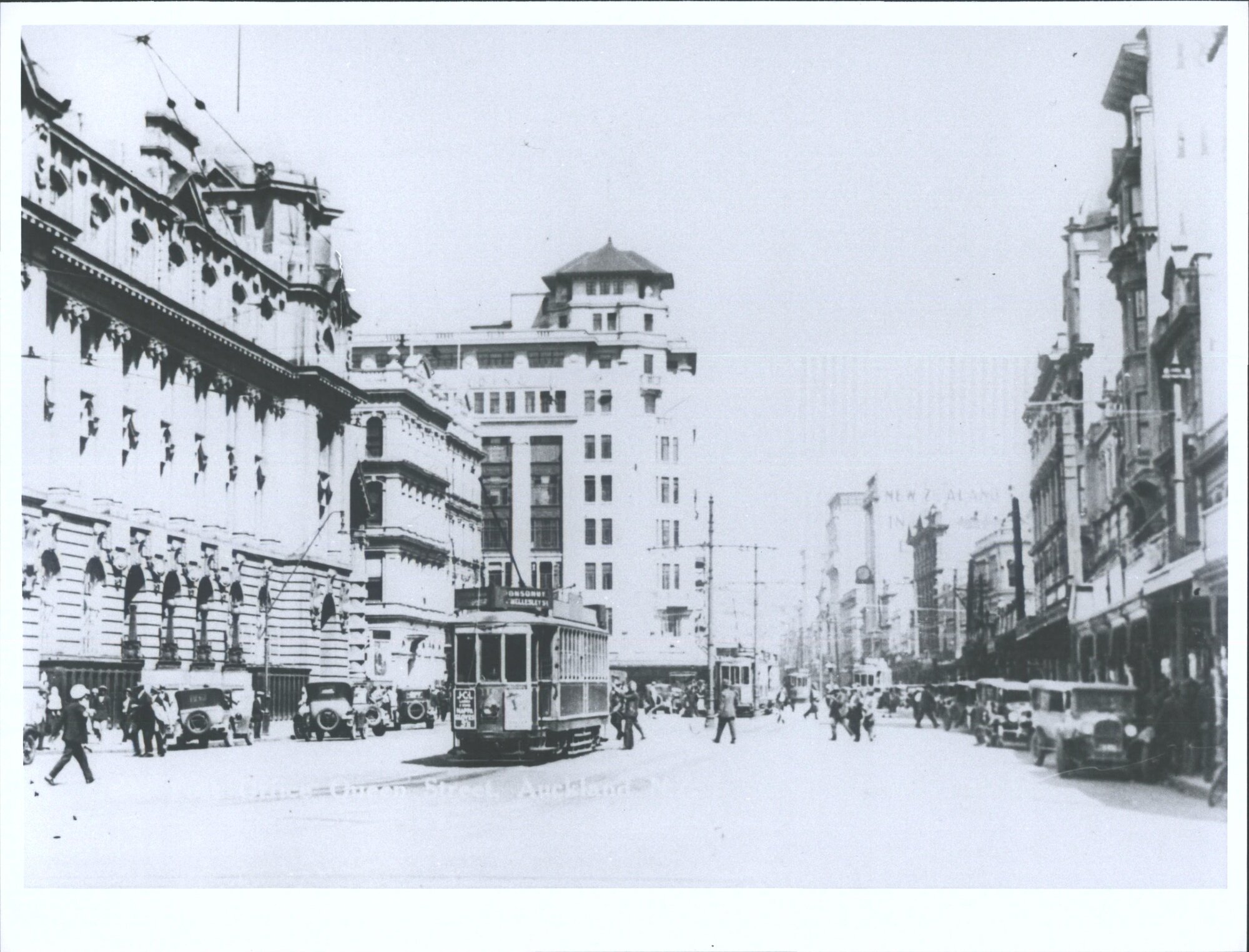 Lower Queen street with cars and trams