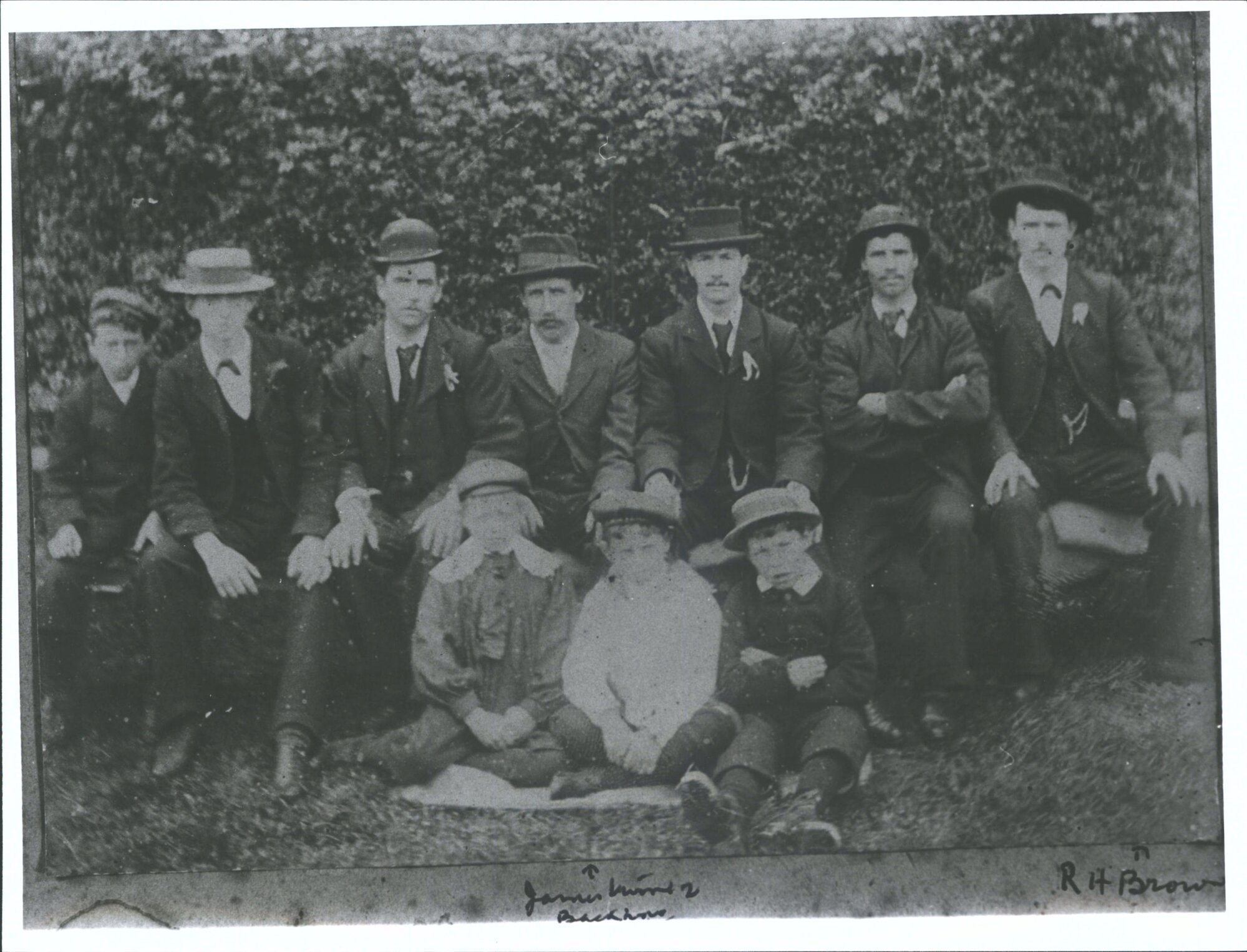 Seated back row, far right R. H. Brown, middle James Moore