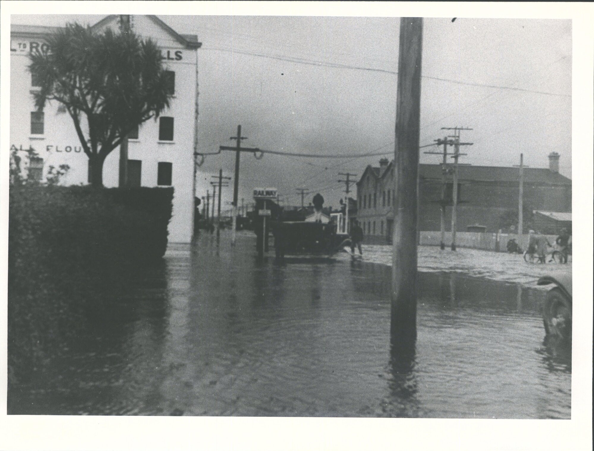 Canon St looking towards Flemings Roller Flour Mill; Otepuni Stream Flooding