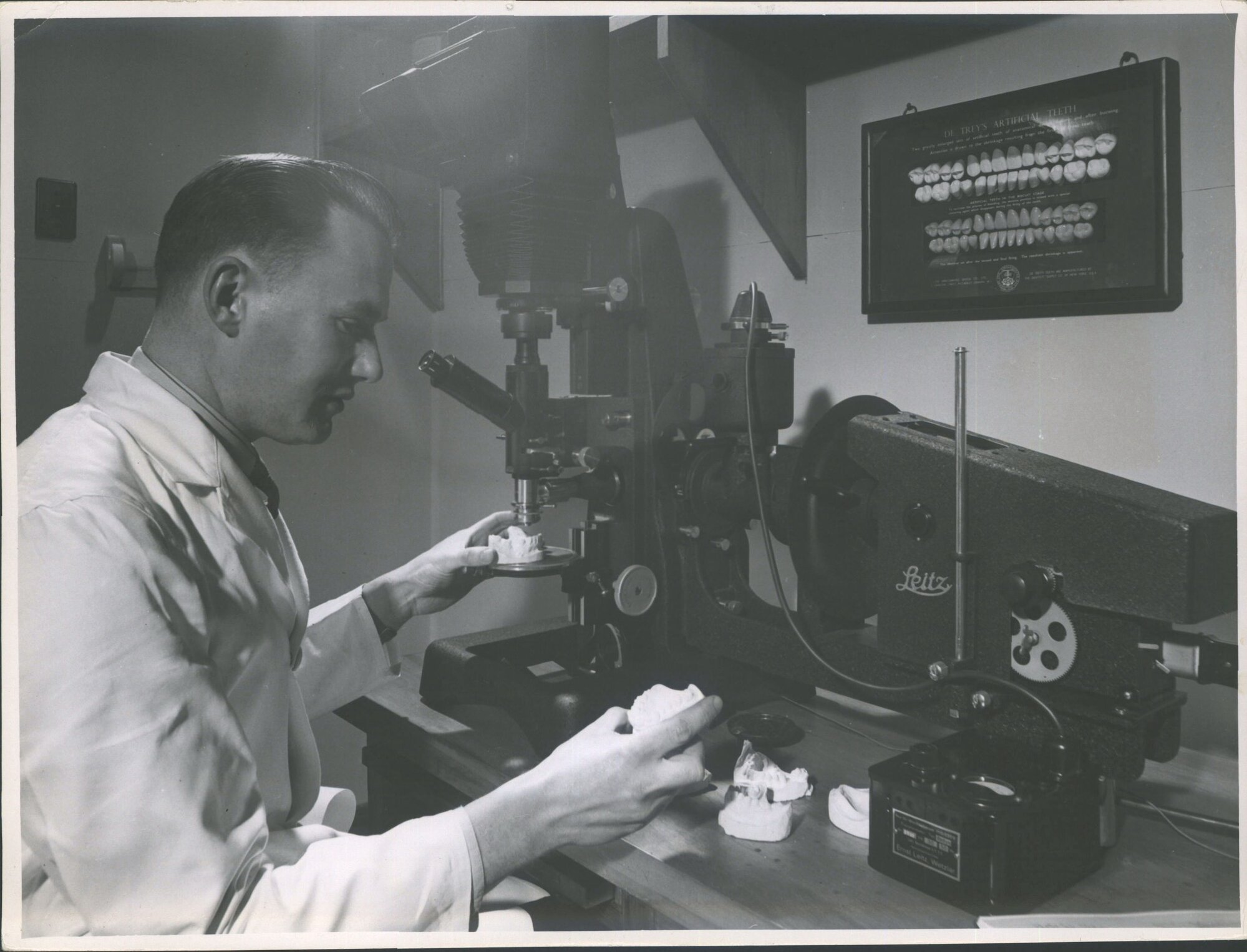 Teeth moulds being used in researchers work on prosthelic materials by Mr F G McLean Lecturer in Dental Materials