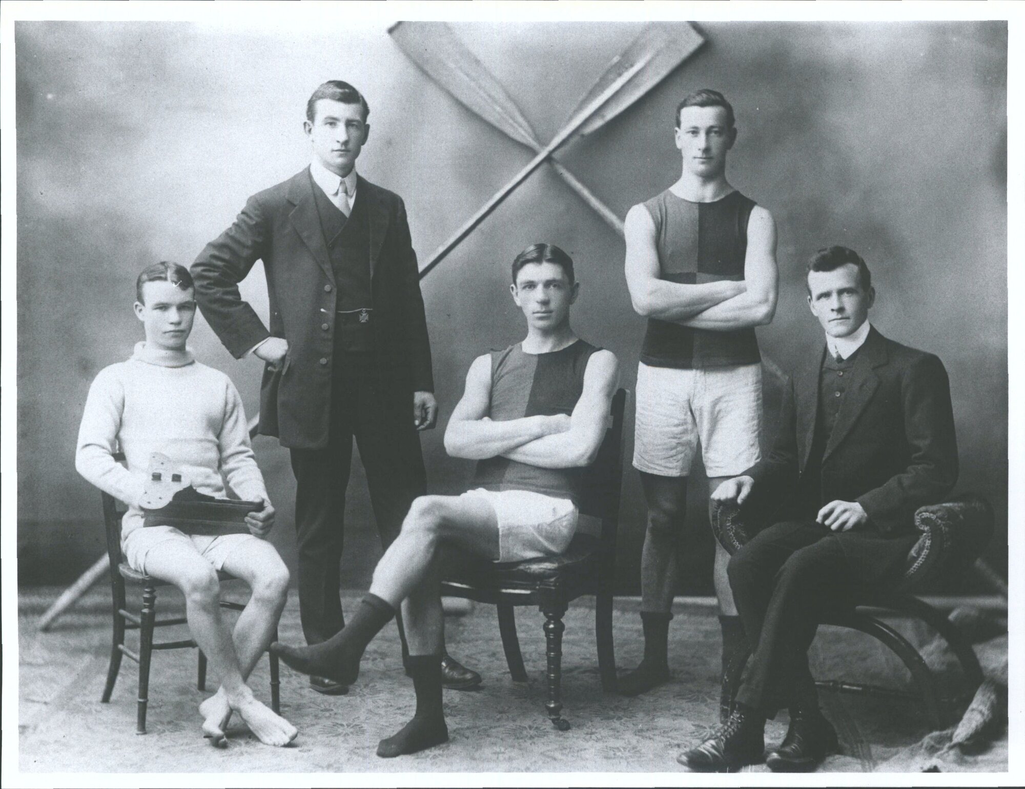 Left to Right  J. Marston (Cox); G.H. Davis (Trainer); C. Purvis (Stroke) J.A. Hogg (Bow); G. Davidson (Captain)