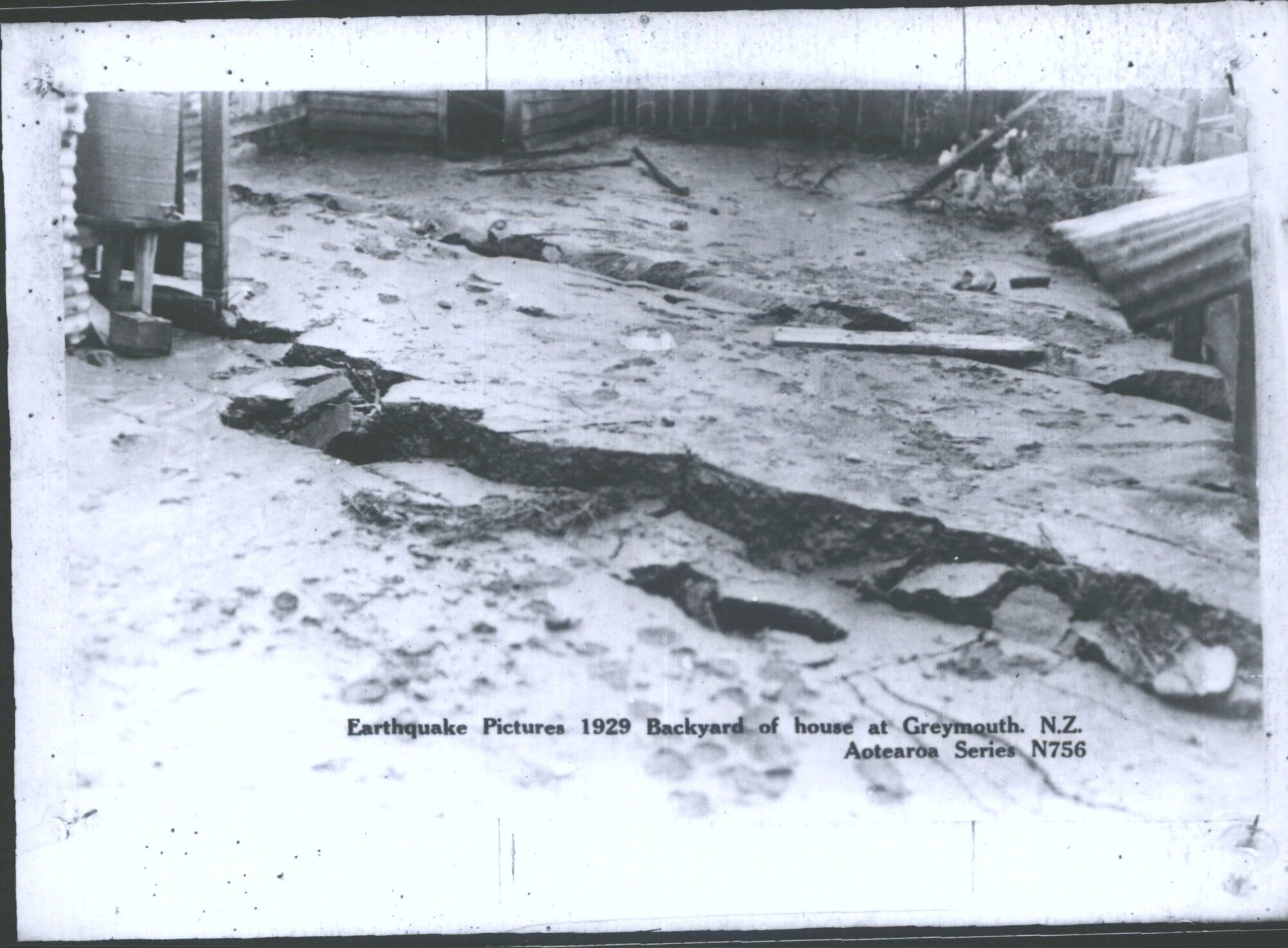 Earthquake Pictures 1929.  Backyard of house at Greymouth, N.Z.