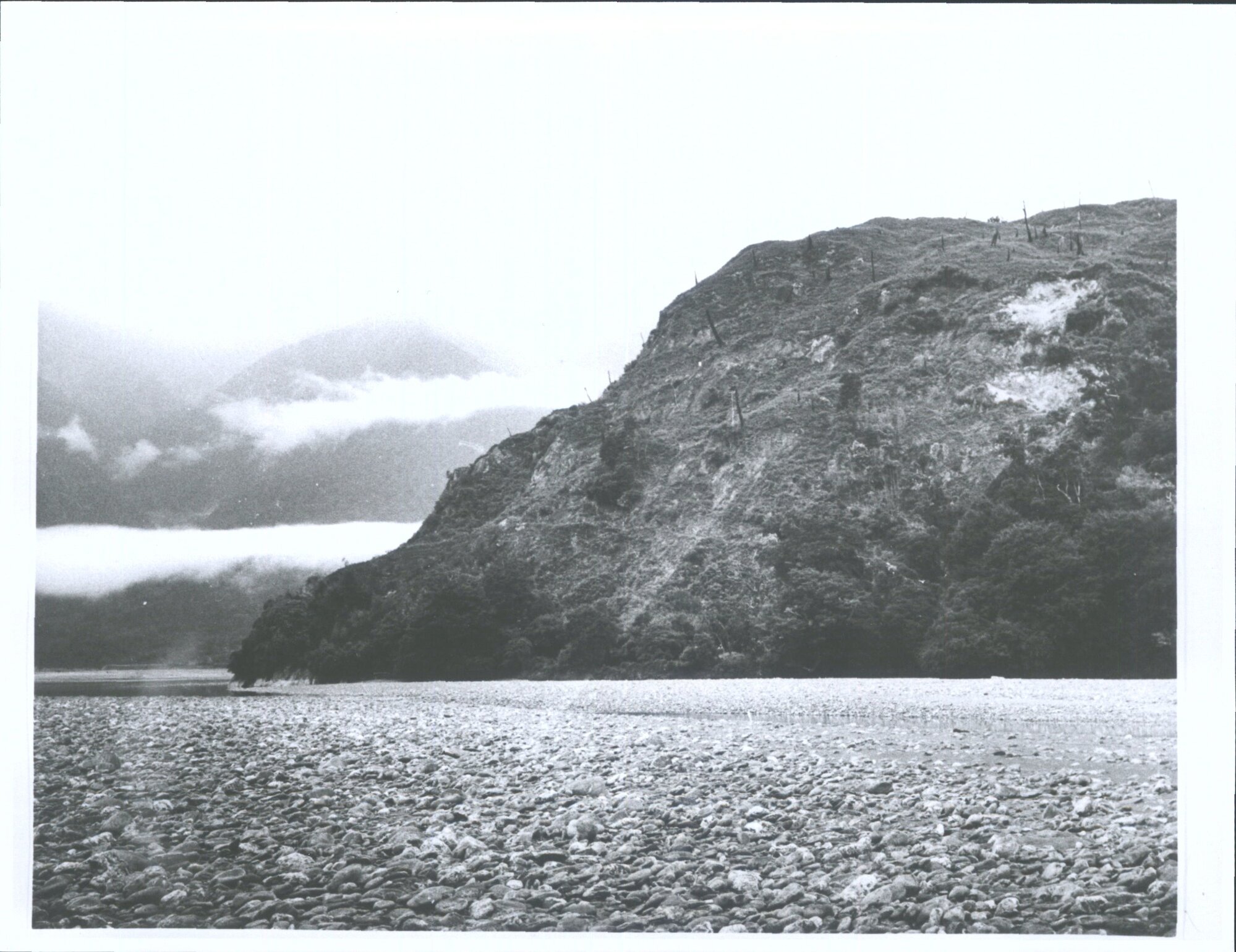"The new road will run around this bluff - Part of Big Bluff looking towards The Haast Pass. Landsborough goes to left [and] Haa