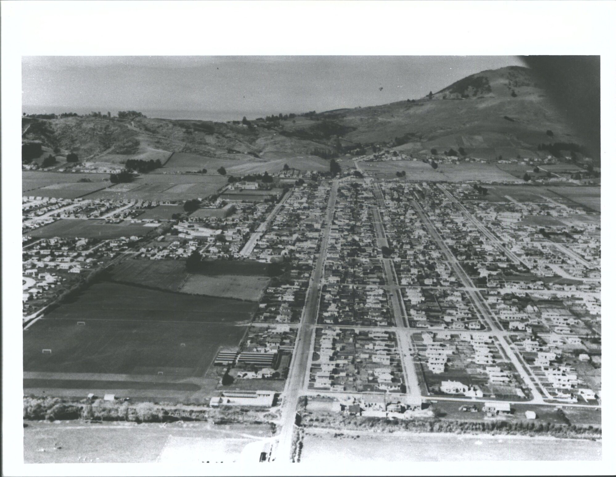 aerial photo of Town before motorway built - [ca 1950s]