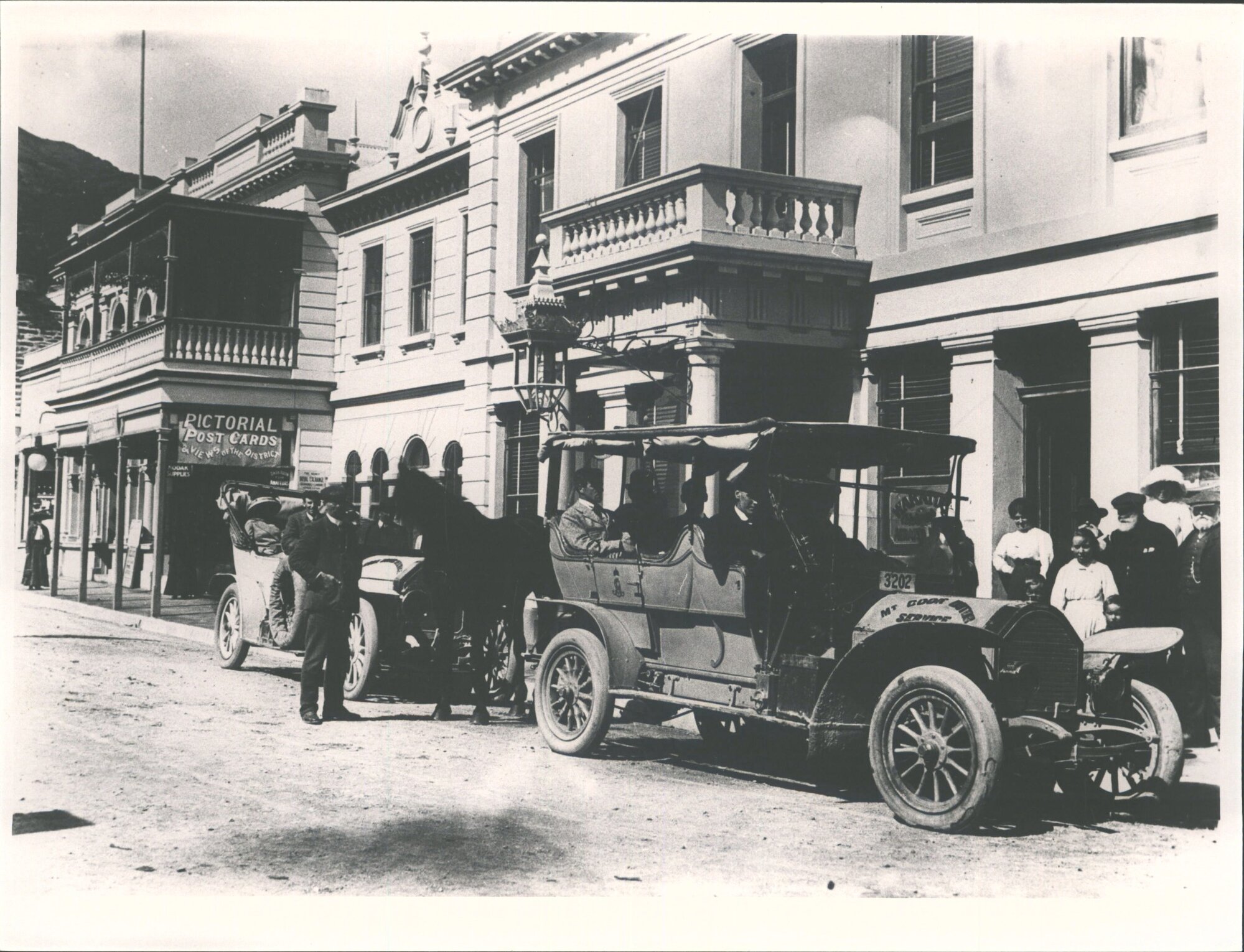Mt Cook &amp; Southern Lakes Tourist Co Service Car outside Eichardt's Queenstown