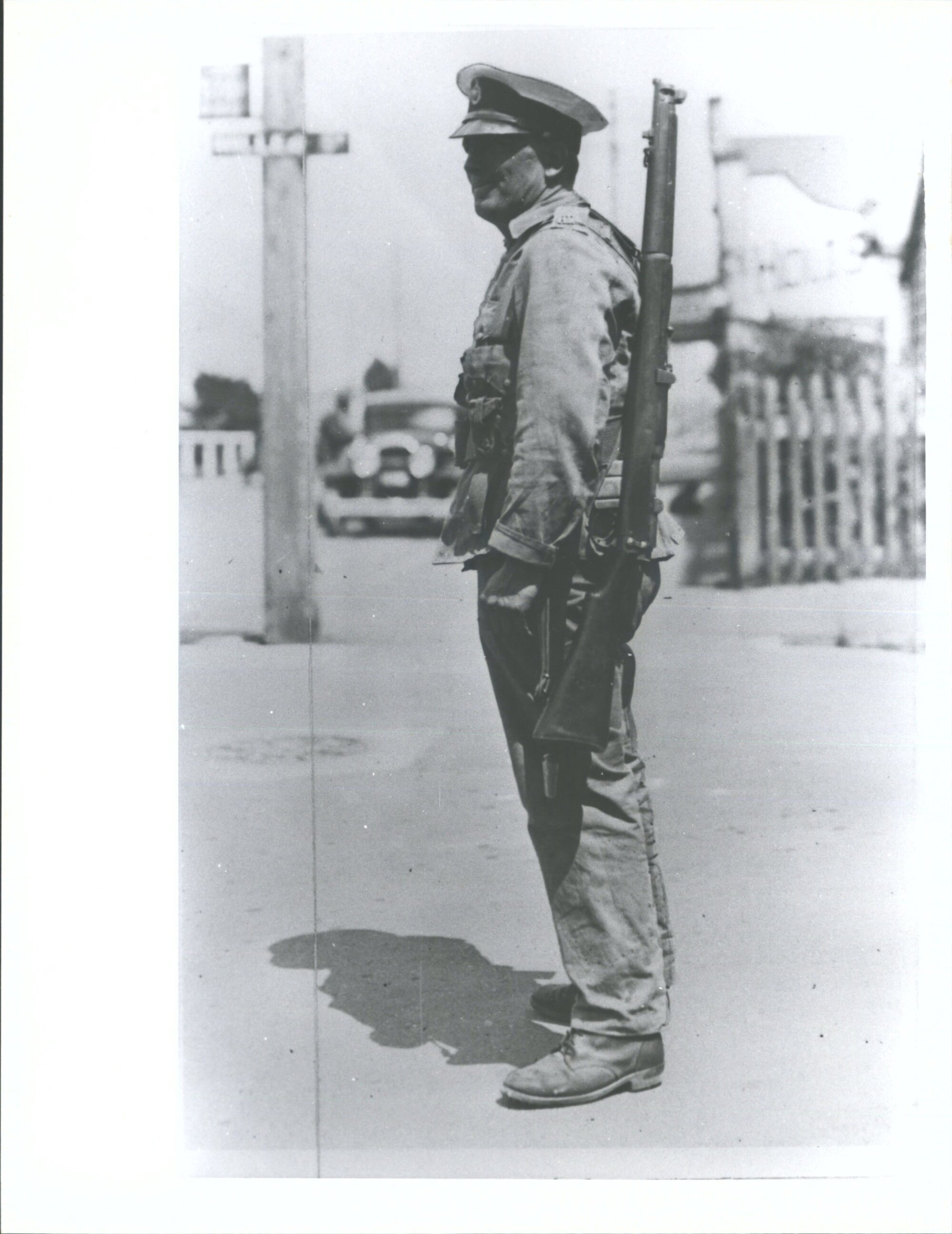 A Royal Marine on duty policing the town"