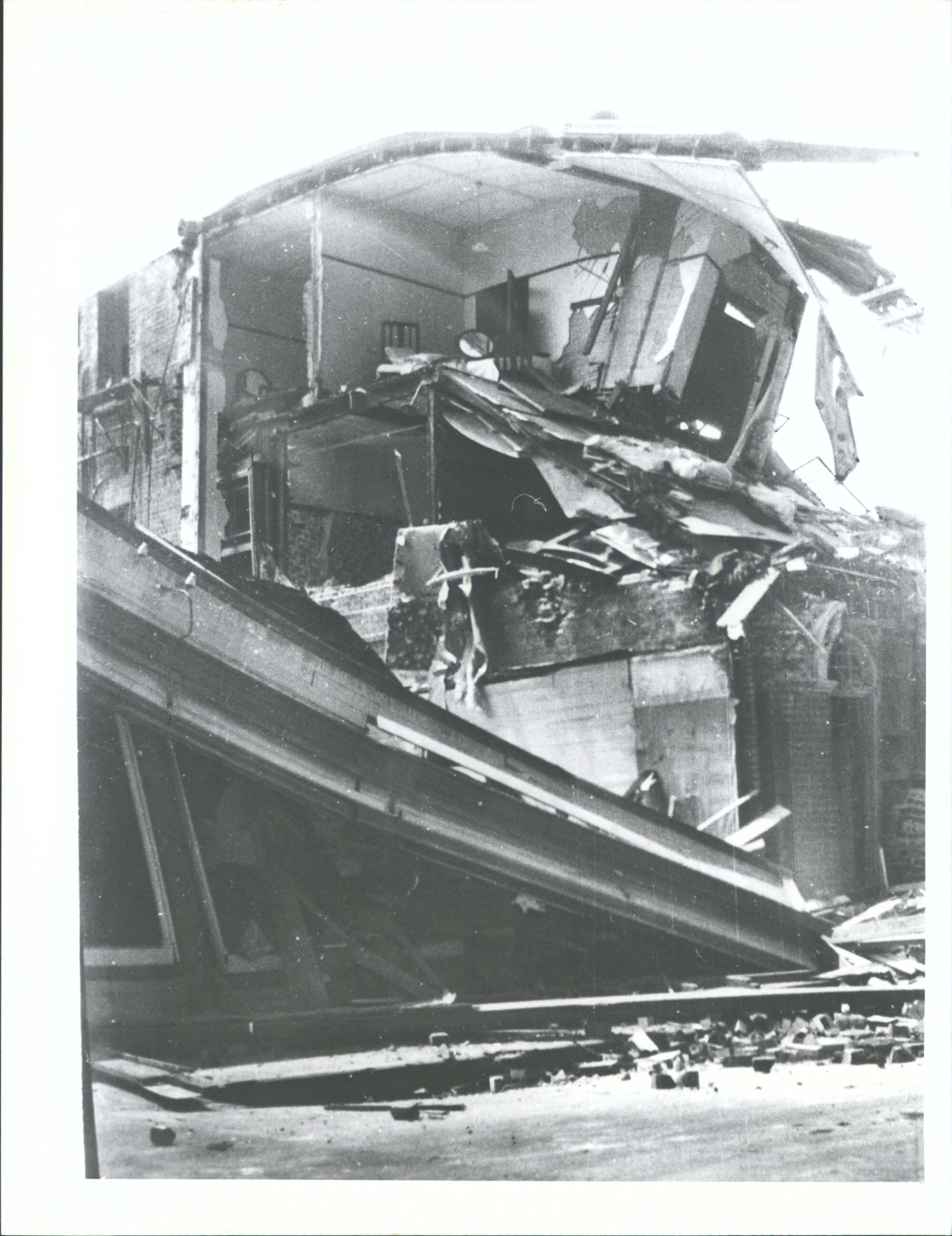 "The wrecked Empire Hotel, Shakespeare Rd, Napier. It was not touched by fire, but was totally destroyed by the violence of the