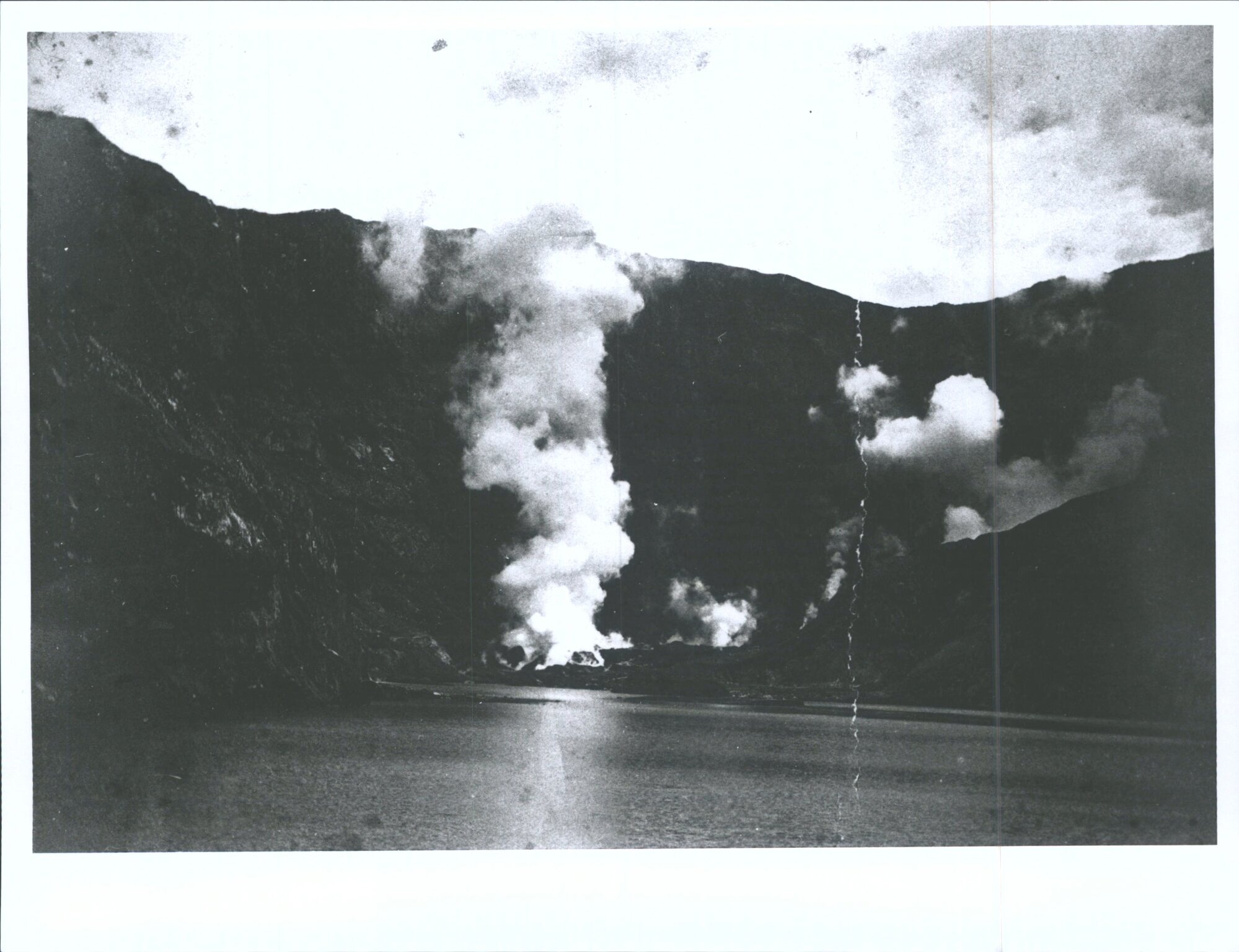 "Column of vapour at the burning crater and sulphur lake of White Island."