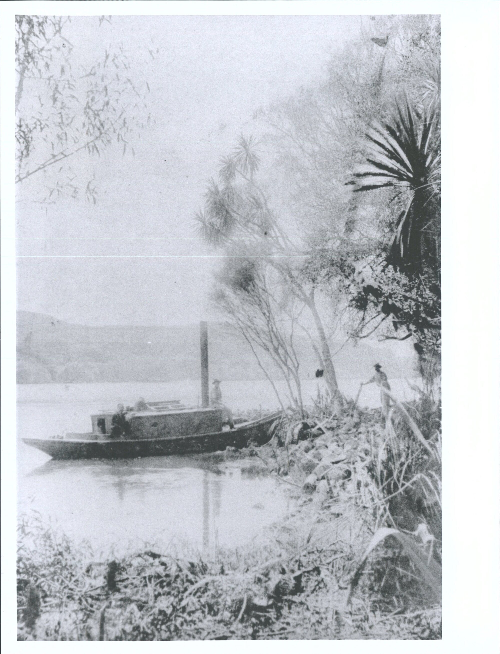 Boat on the shore of Waikato River