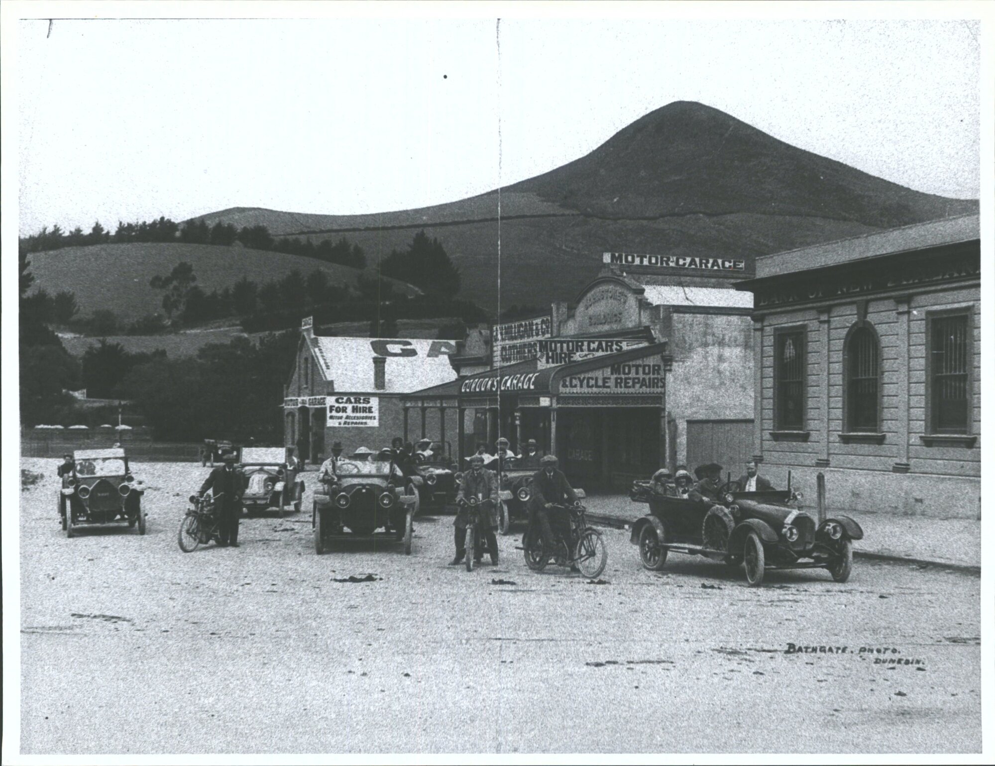 Motor Garage, and J.H. Milligan &amp; Co., Clothiers