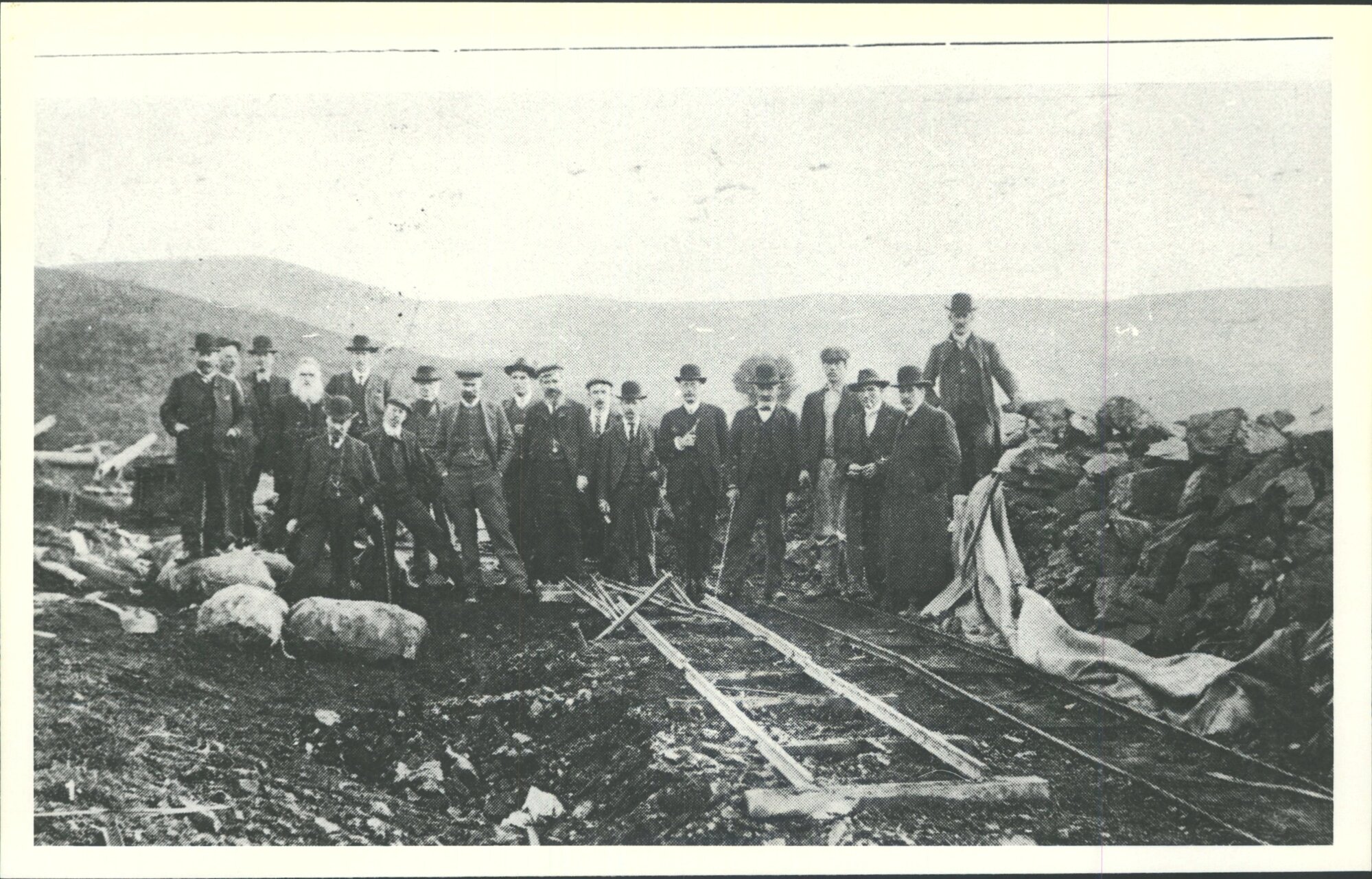 Group of directors &amp; visitors at mouth of the drive