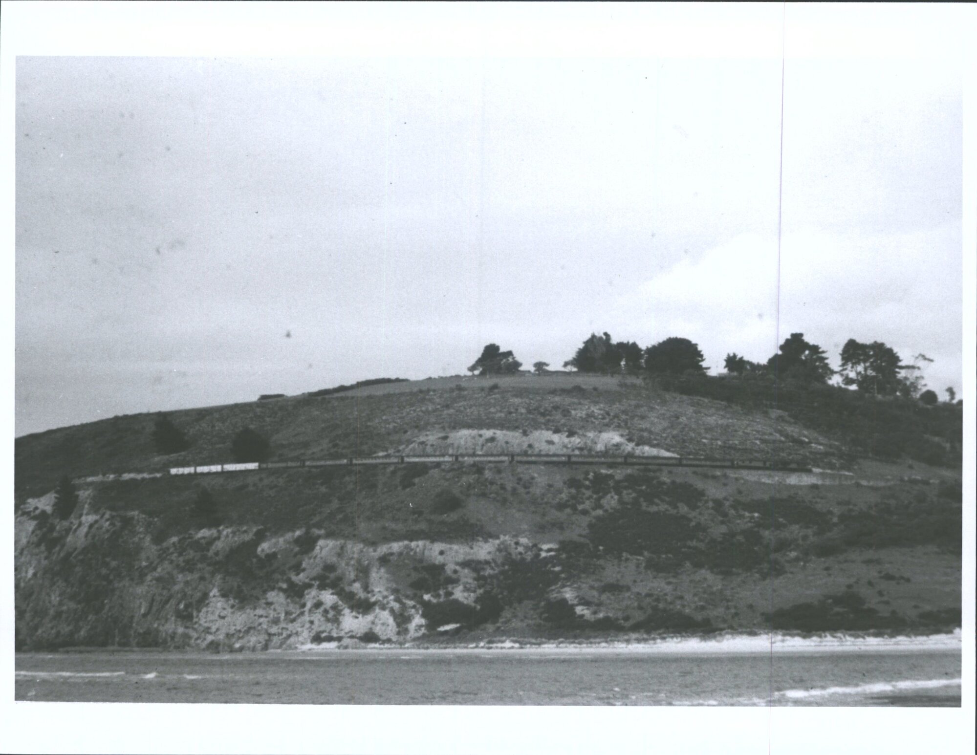 Train at cliffs end of Warrington Beach