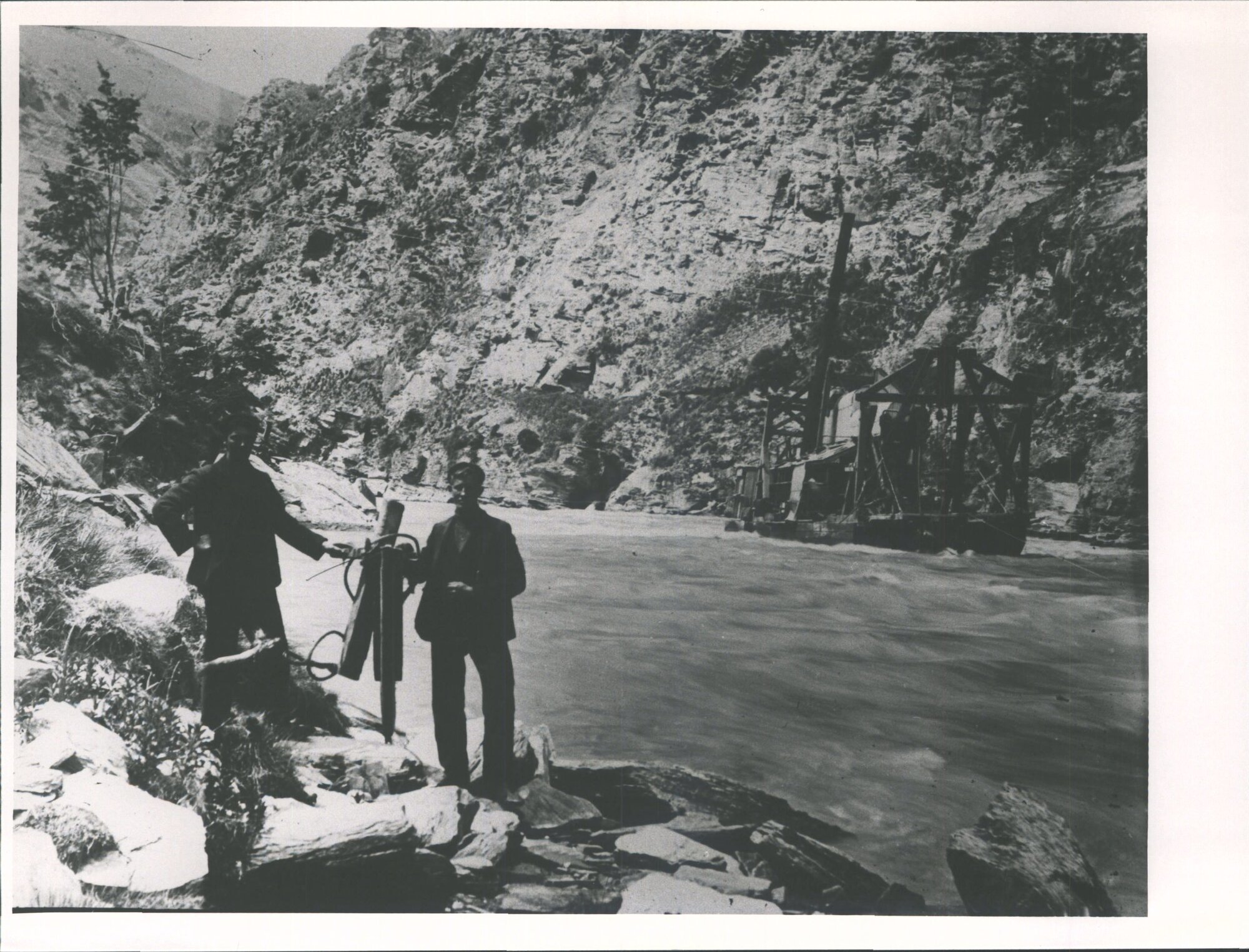 Unidentified pair next to refloated dredge