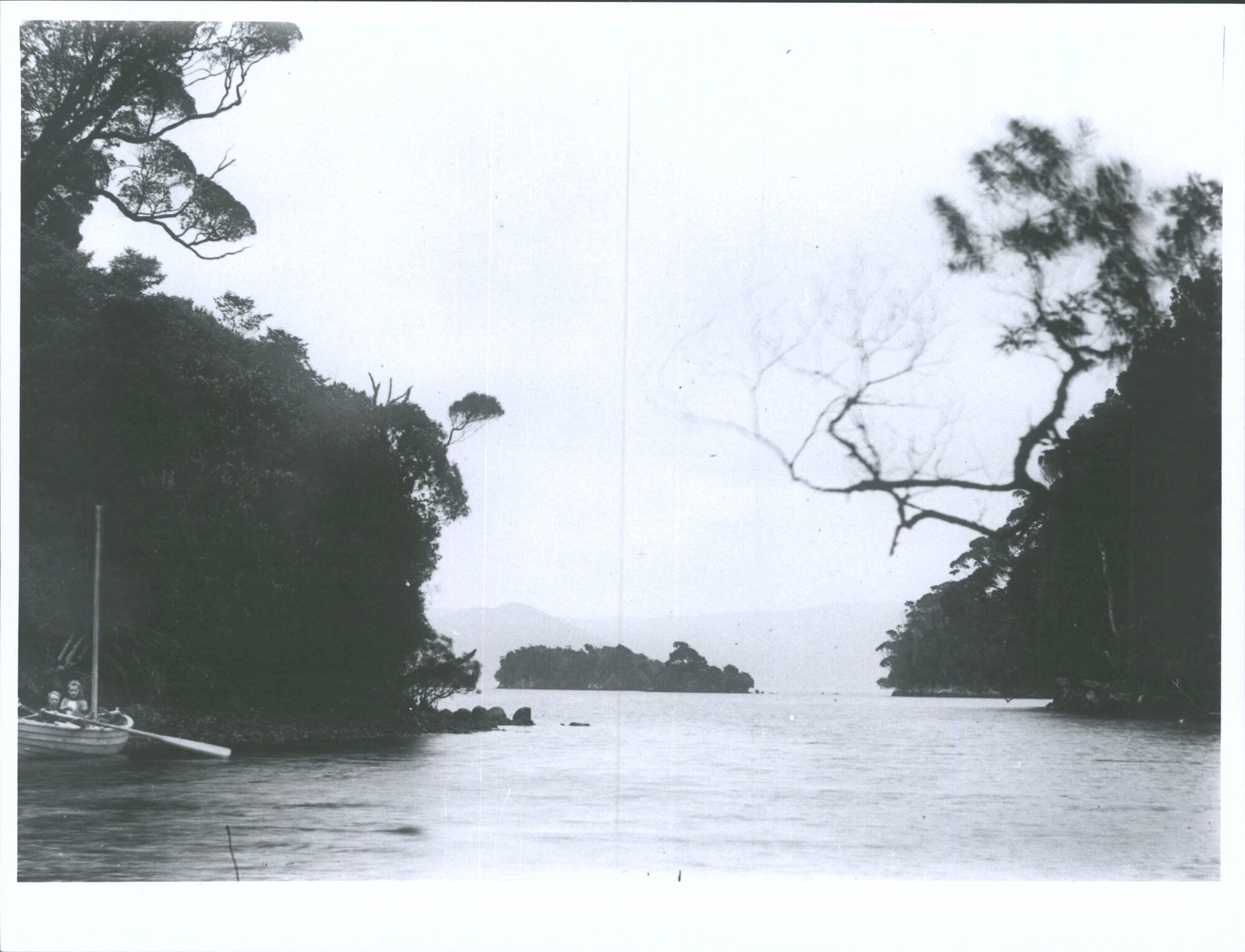 Children in a boat in Paterson Inlet