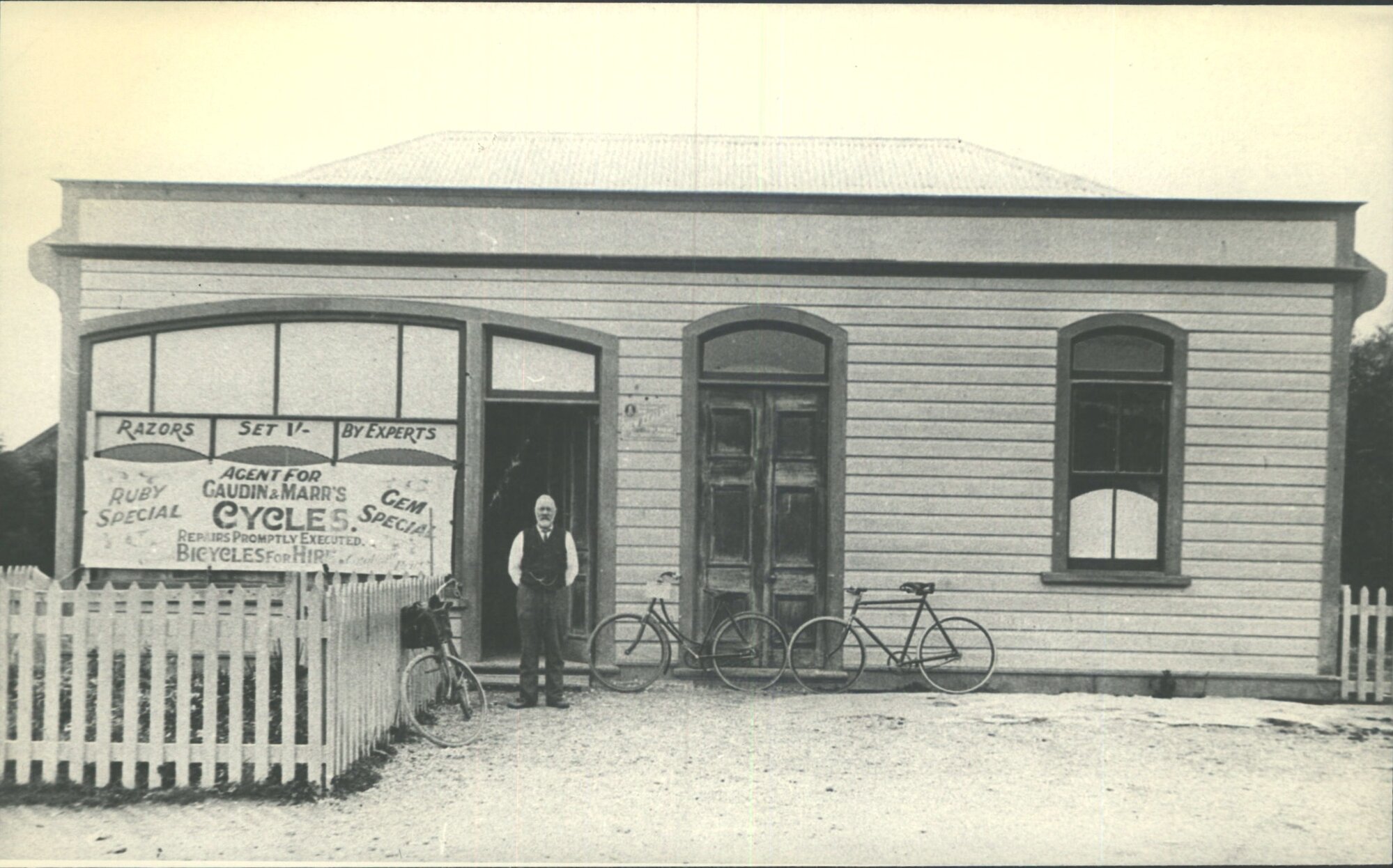 George Duncan outside bicycle shop he had in the Stirling Athenaeum