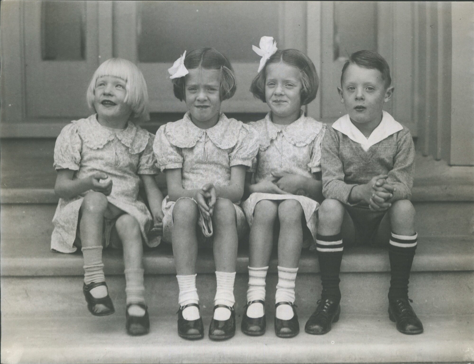 JOHNSON FAMILY QUADS. ABOUT