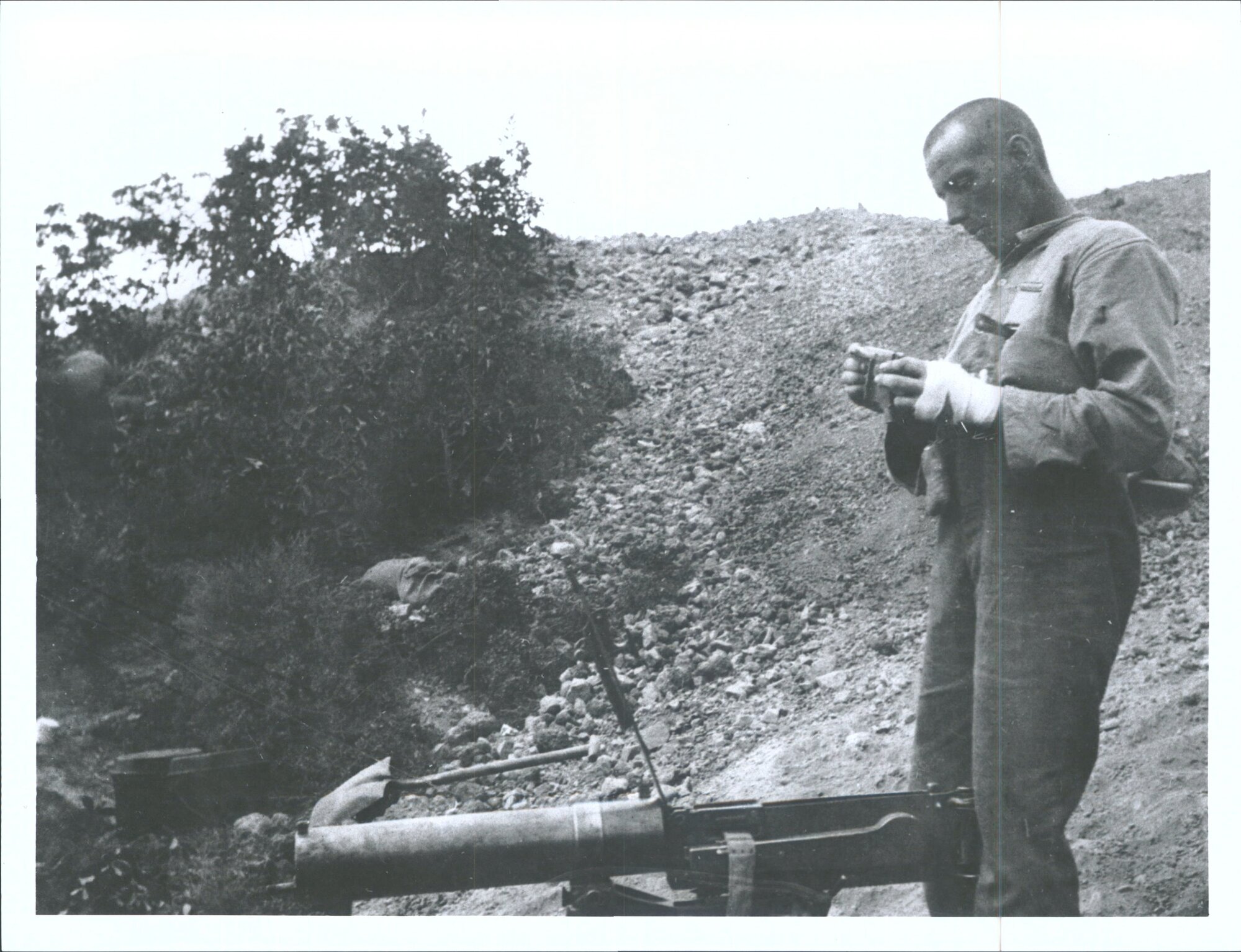 "Walter Cobb With Turkish Machine gun captured by C.Y.C. at Hill 60."