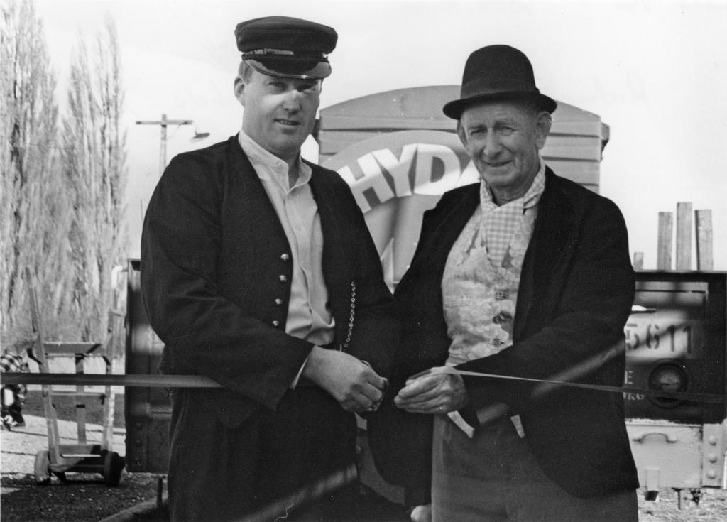 Hyde Photograph 4, two men cutting ribbon at Hyde
