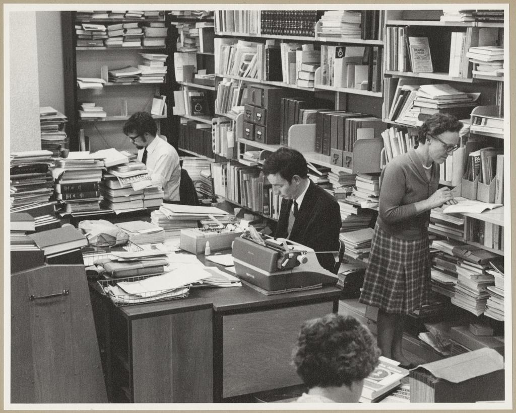 Alan Edwards, Max Broadbent and Lindsay Henderson working in University of Otago library