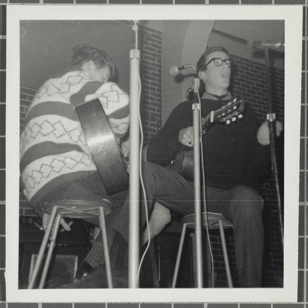 Duo with guitars performing at the 'Folk Proms Concert Capping '67', Union Hall, Dunedin