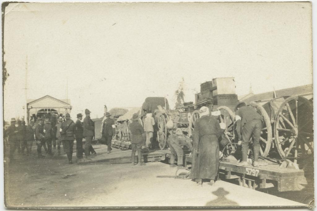 Scene of loading or unloading at an unidentified railway station