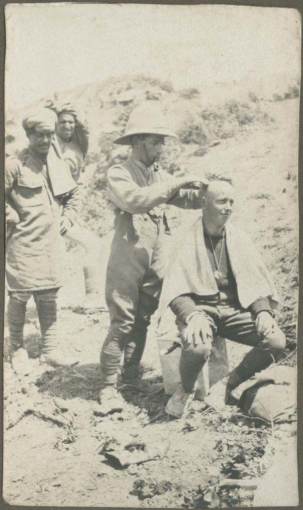 Soldier getting a haircut