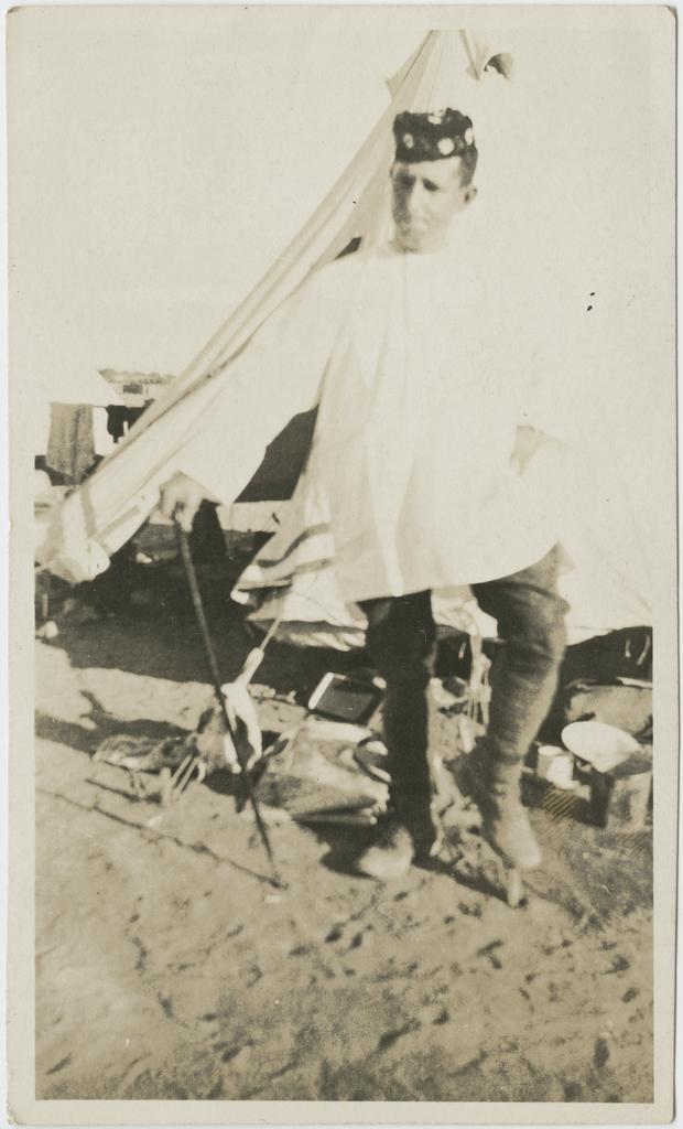 Man in front of a tent