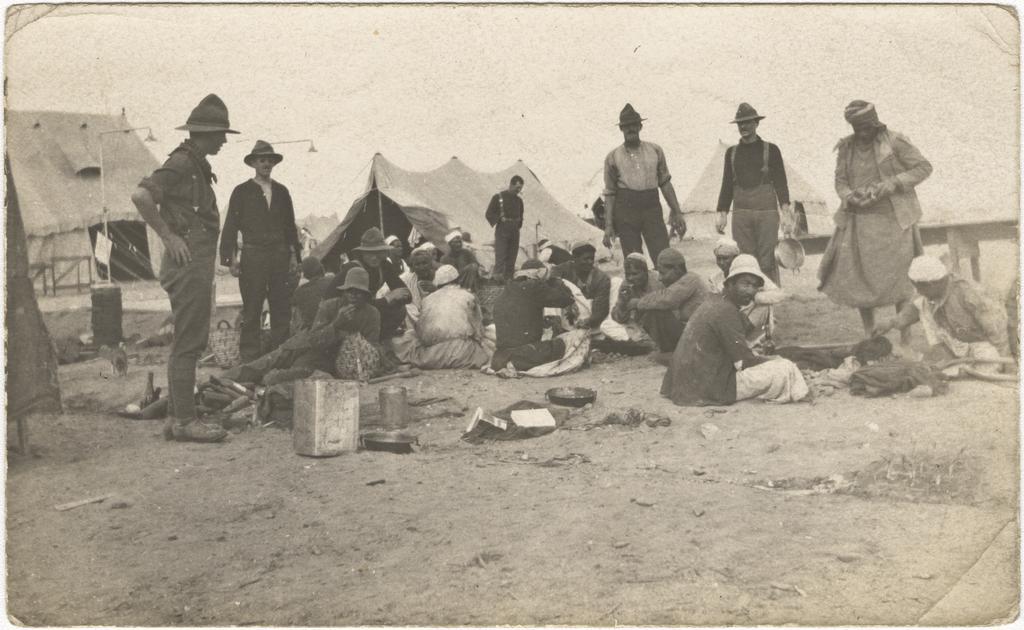 Soldiers [with visitors?] in camp