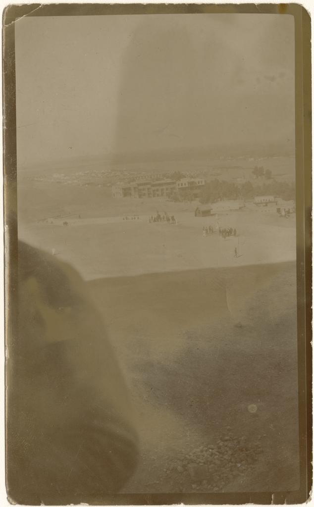 'This is part of the Australian camp. The dark part in the foreground is the shadow of the pyramid'
