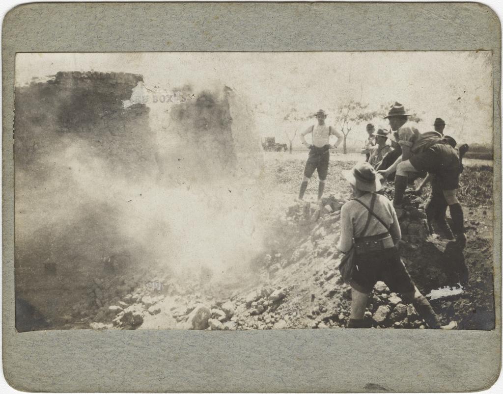 'Some of the Anzac's down at Cape Helles viewing the results of Lizzies Shots into the post at Sedd el Boka'