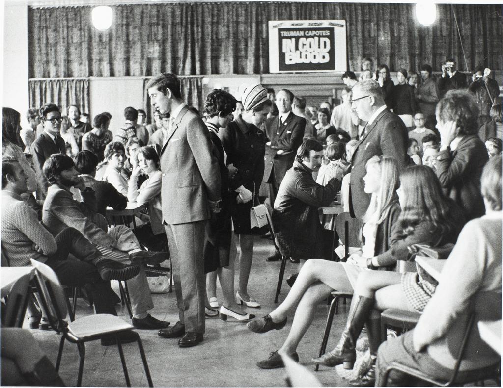 'In the main canteen of the University Union, The Prince of Wales, Miss Laraine Waters (OUSA), Princess Anne, Mr P.J. O'Dea (N.Z. Director of royal tour)'