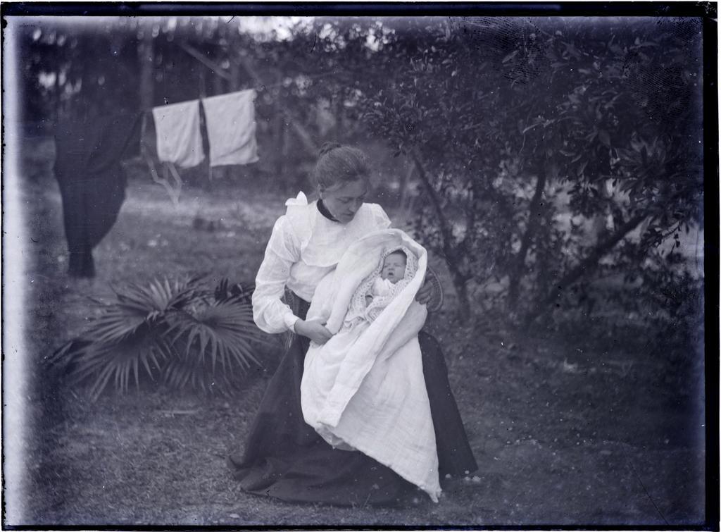 Mrs Margaret McNeur holding her daughter, Jean, Canton