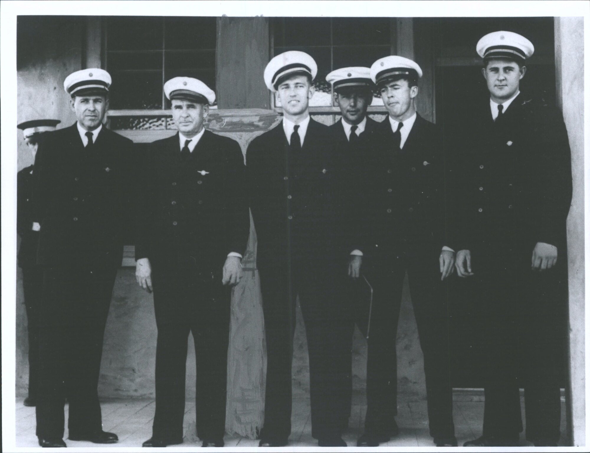Pan American Airways, Captain E. Musick (far left)