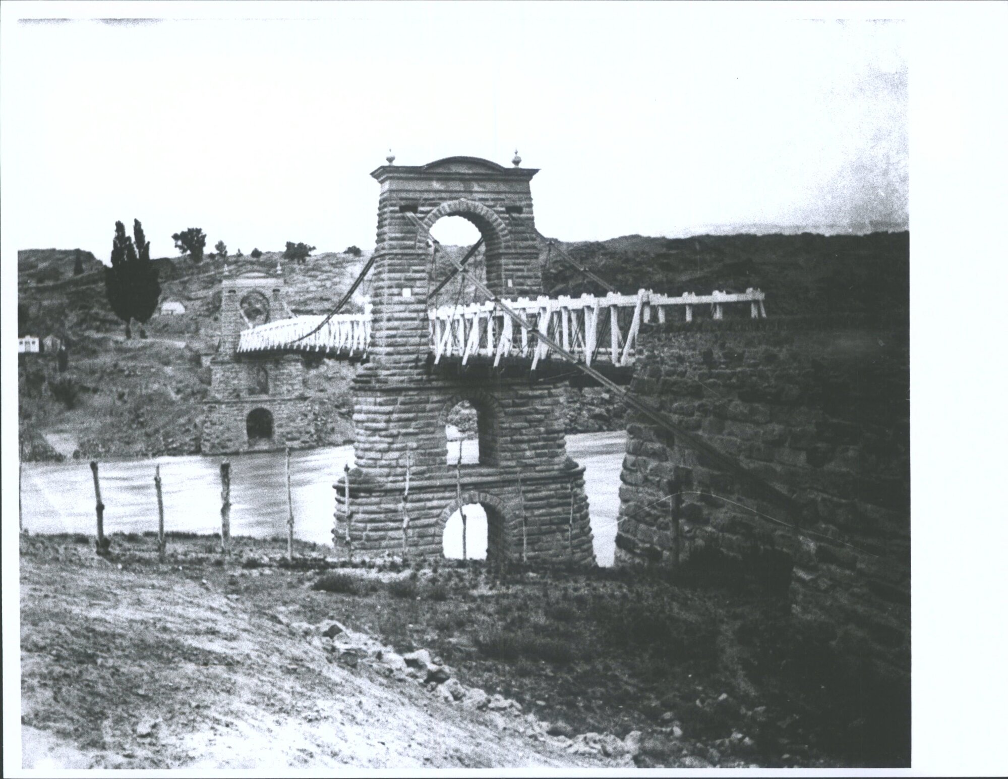 [Bridge from down by the River]