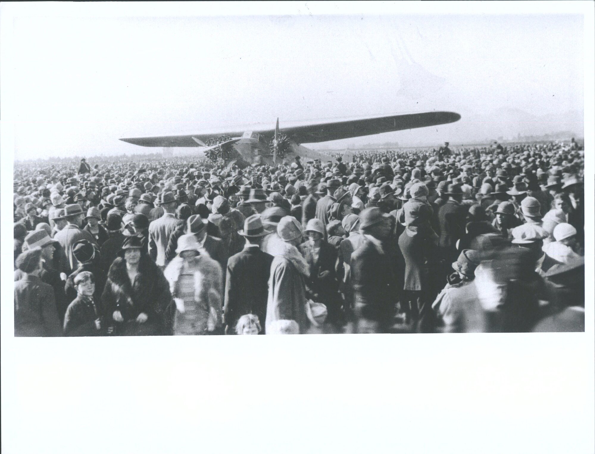 Crowd looking at aircraft