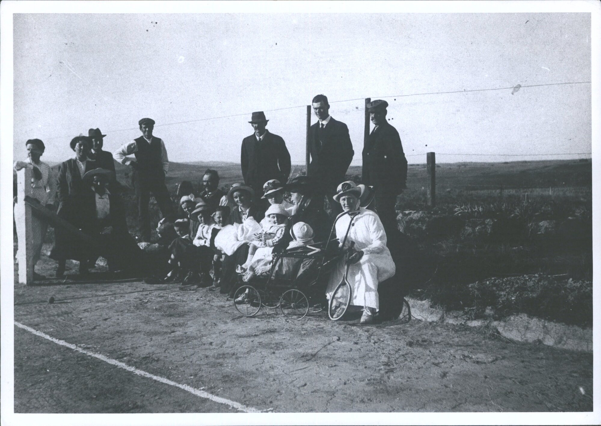 Mine director and family on new tennis court