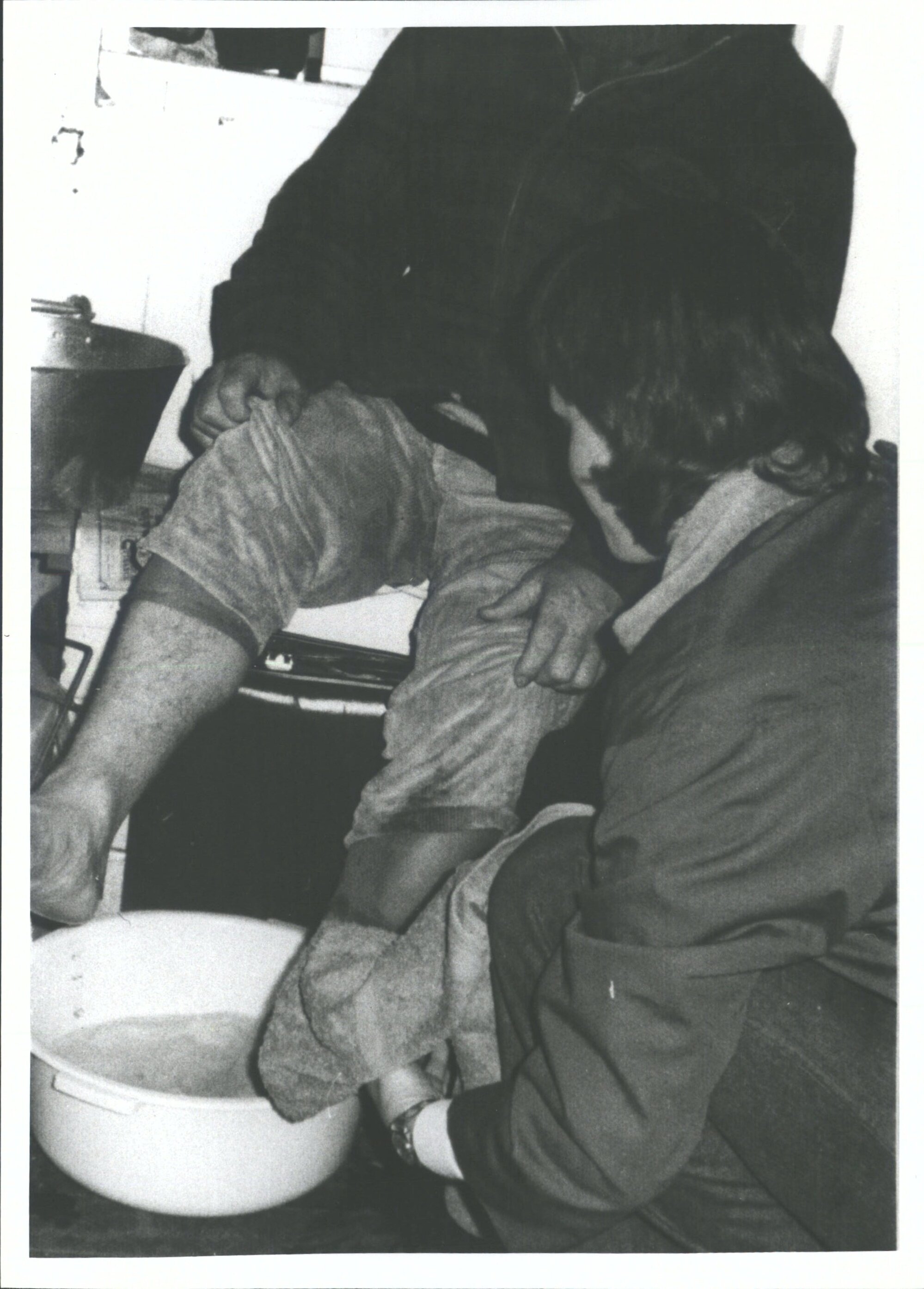 Warming up (pantyhose protruding from trousers)