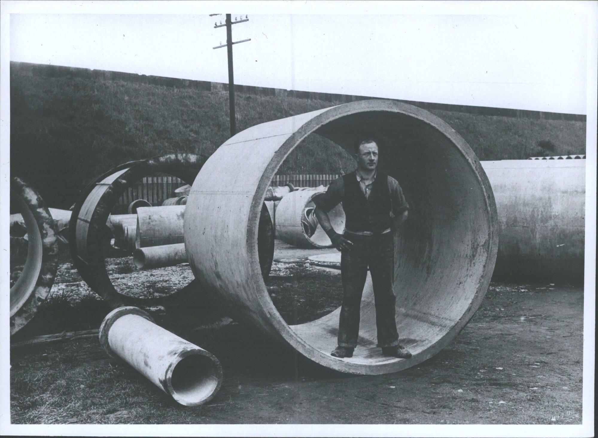 McSkimming - Son's concrete pipe works at Kensington, Dunedin Showing re-inforced concrete pipe 6 feet diameter- original captio