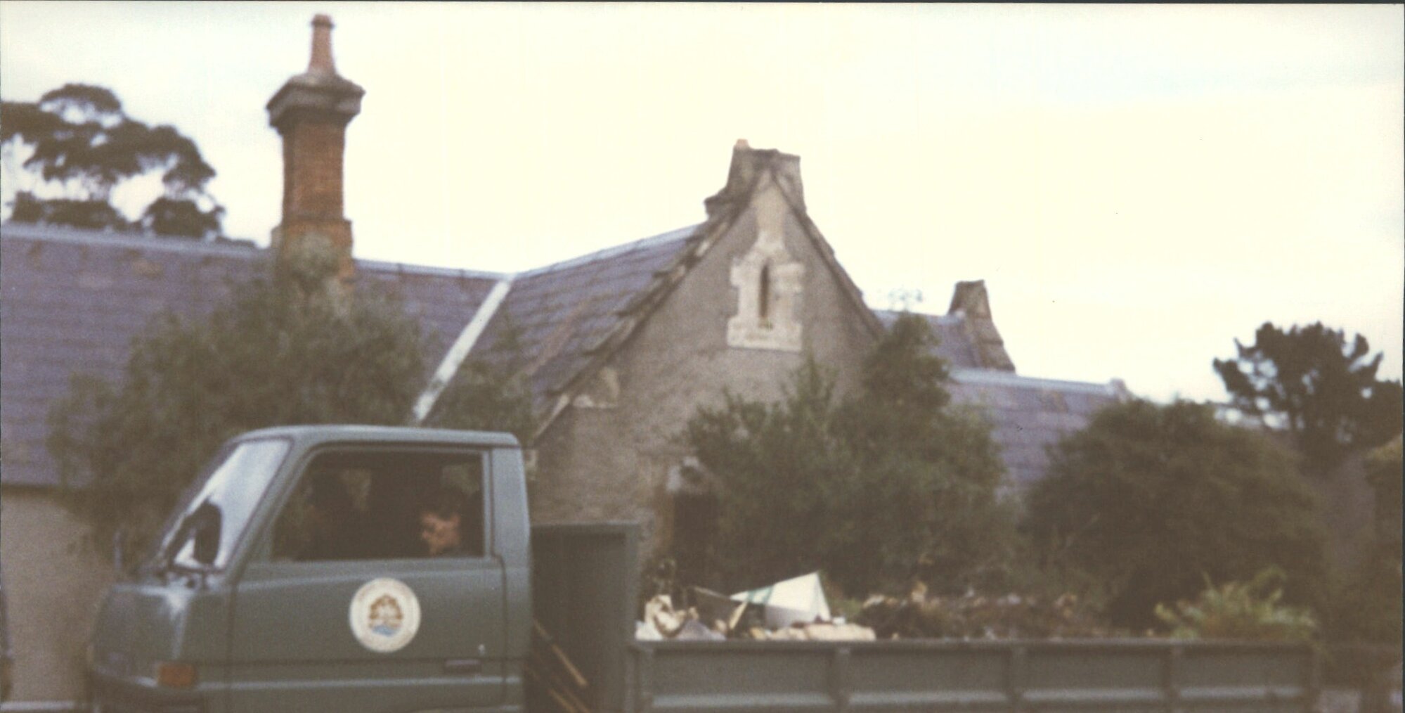 D.C.C. Parks &amp; Reserves truck,  Caretakers Lodge used as a tool shed