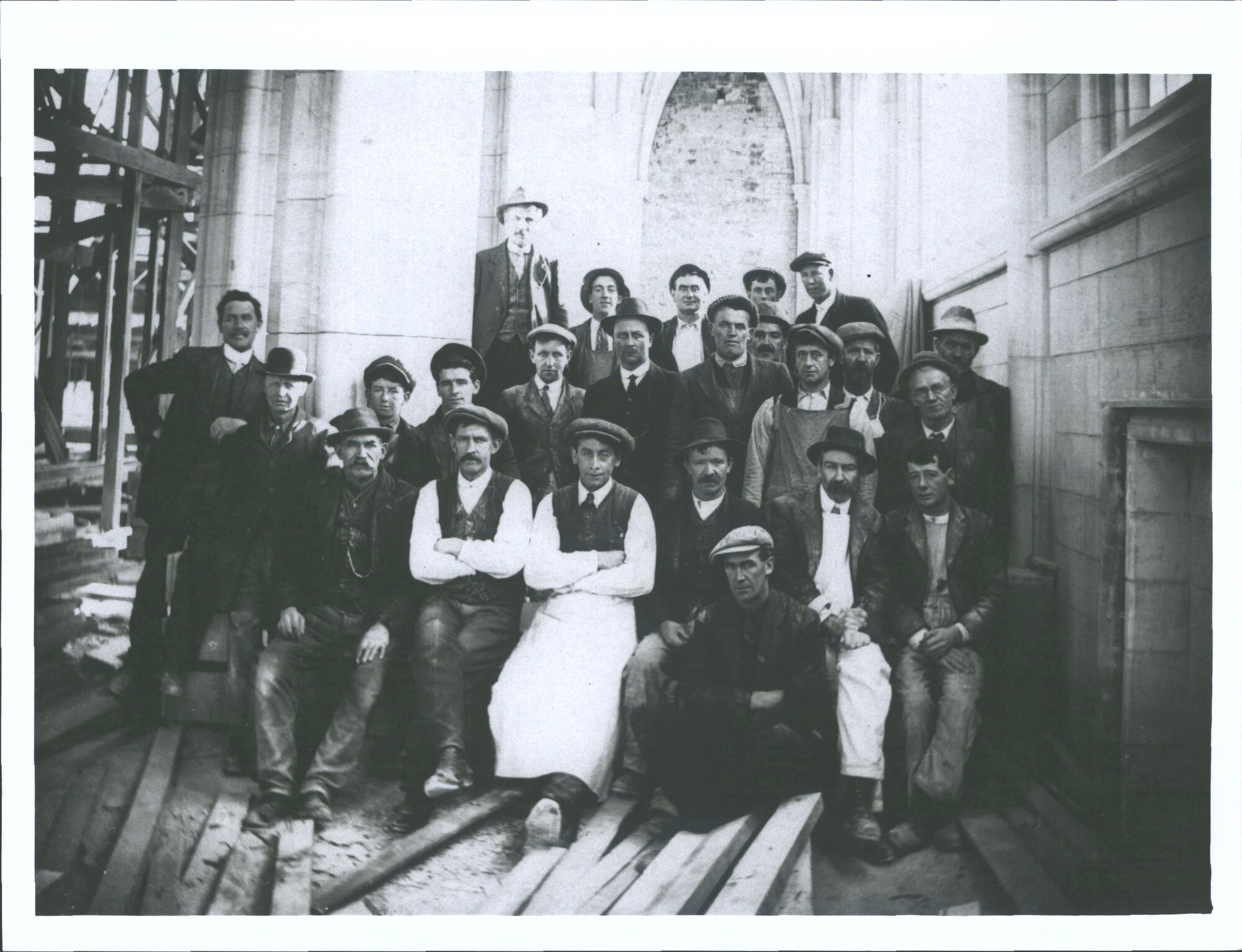 Construction, Mar[r] &amp; McLeod plasterers working on building George Callister 2nd front row, 2nd from right