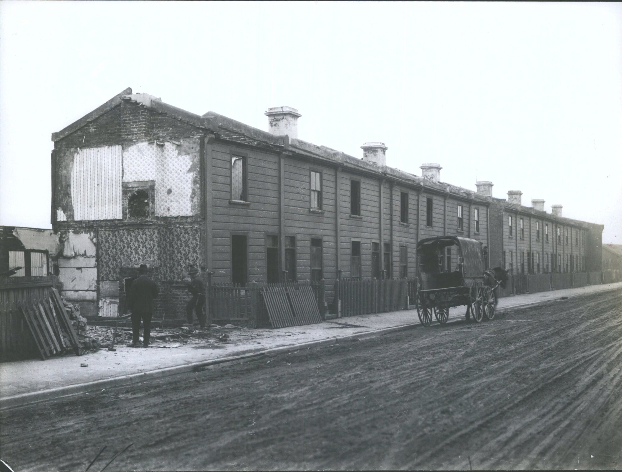 Terrace houses being demolished in Harrow Street