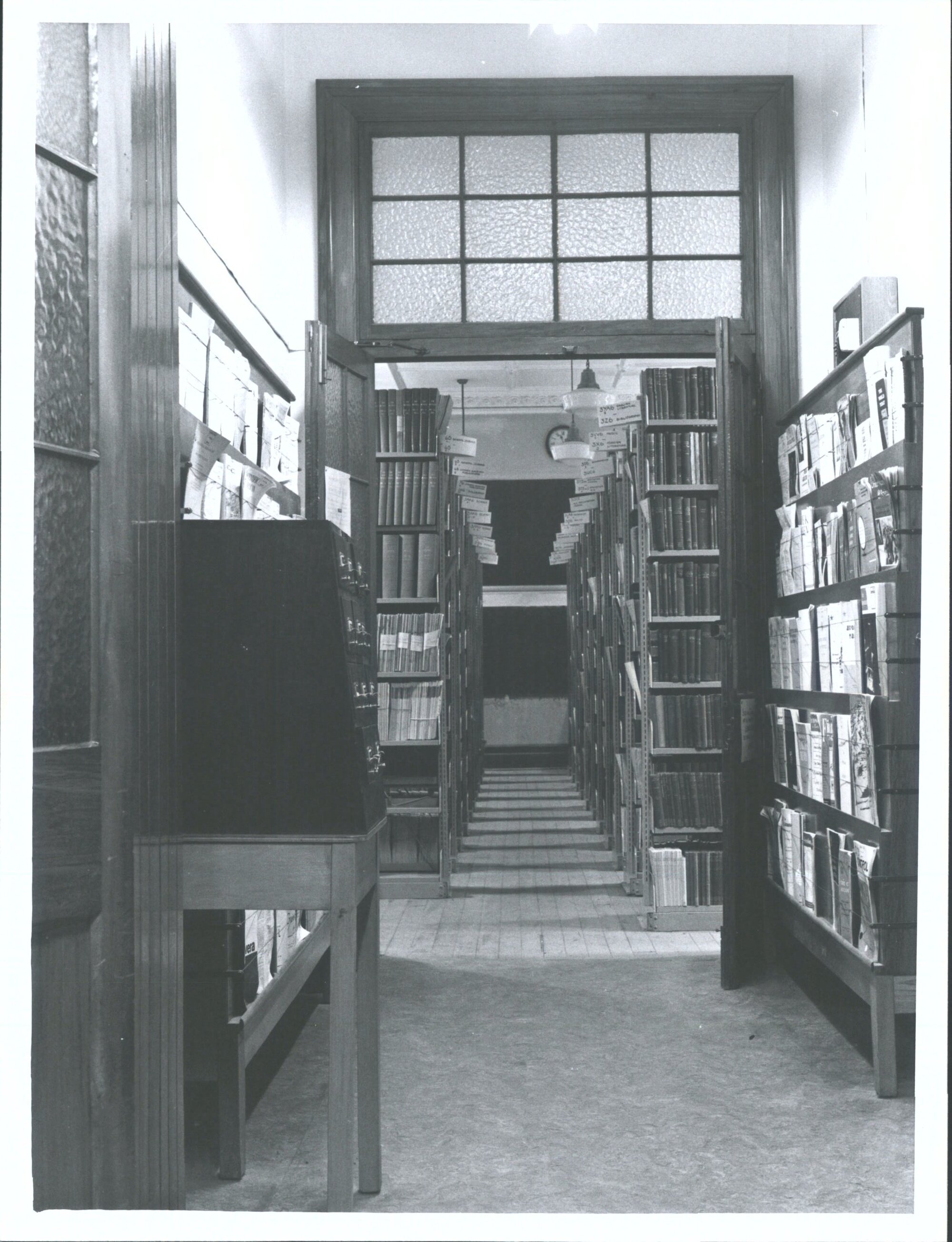 General view into lower oliver periodical  stack taken from doorway into serials department