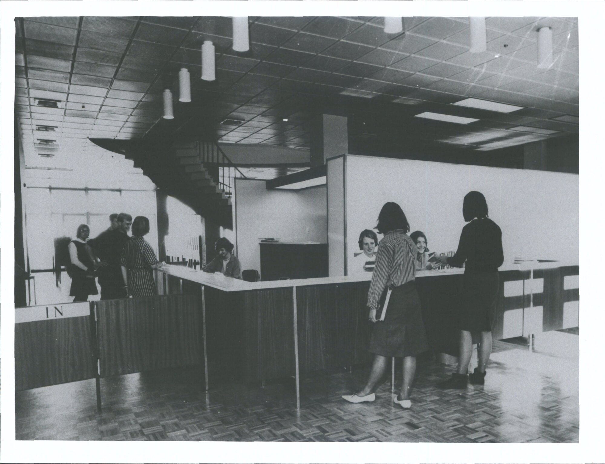 Circulation Desk  Seated behind at left to right Alison Hercus Denise McFarlane, Mar -Jo Donnelly.