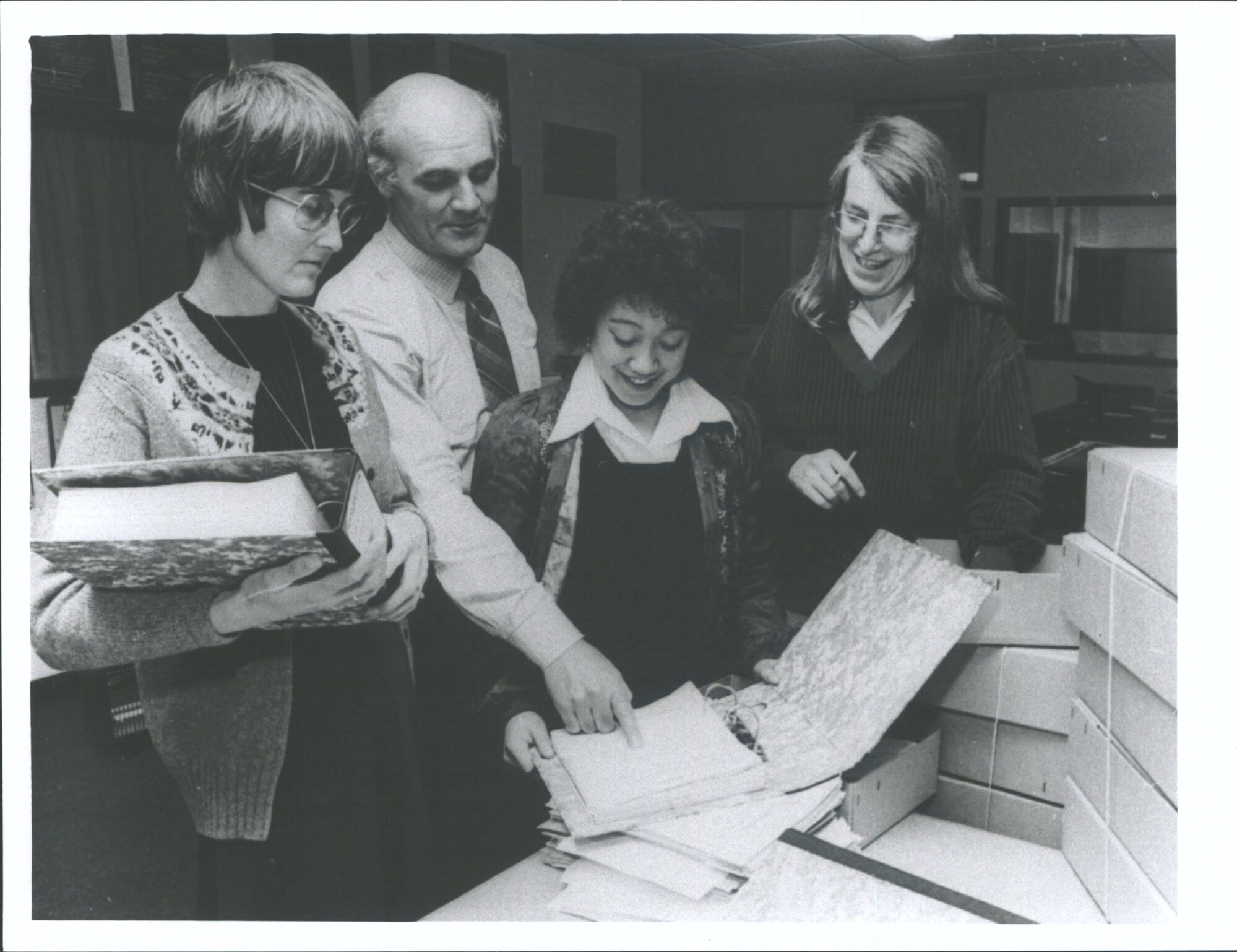 Hocken Library Archivists examine Civil Defence Records  