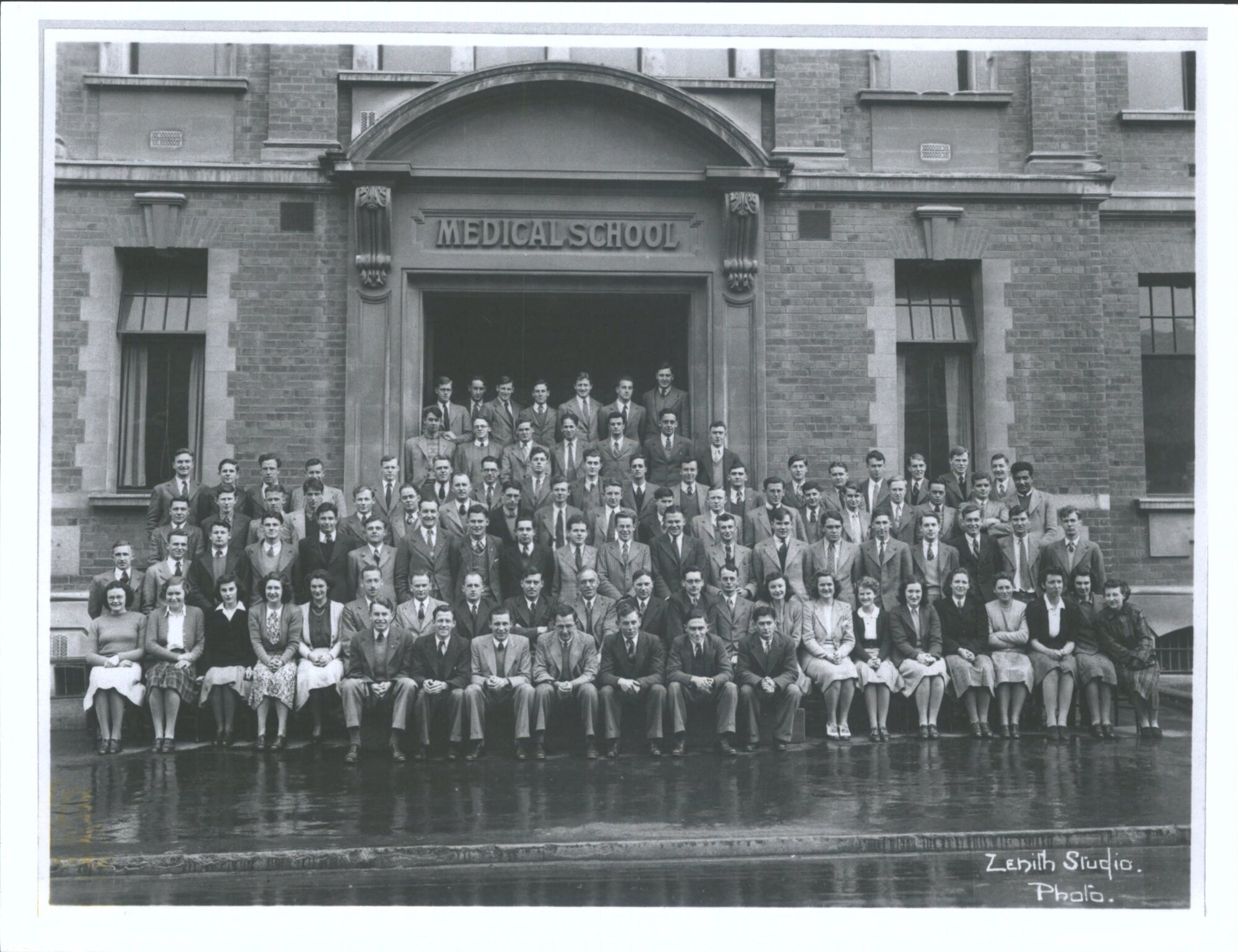 3rd row from back, 3rd from right end ; M. Weston.