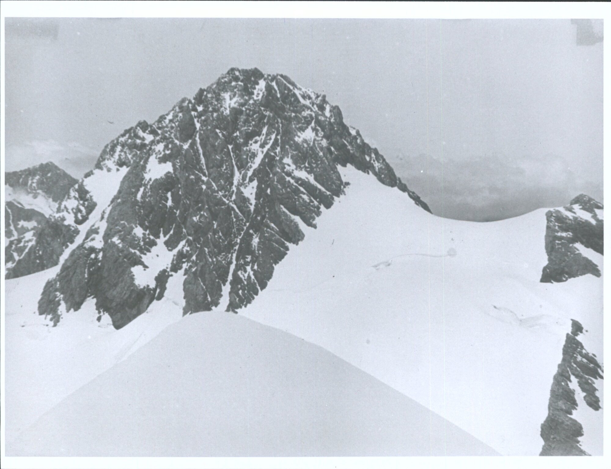 (8200 feet) from the summit of the white pyramid the exact summit of which appears in the foreground first ascent by A. J. Scott